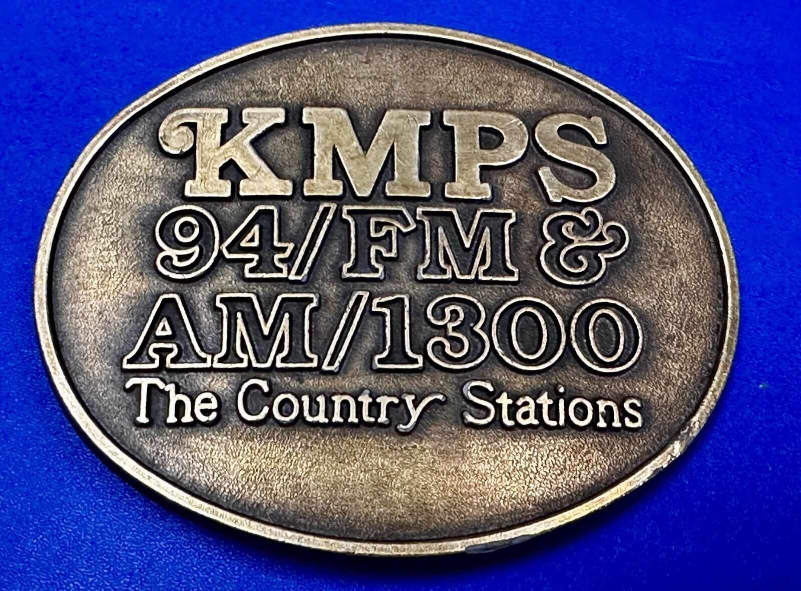 The Country Radio Station KMPS 94/FM & AM/1300 Advertisement Belt Buckle