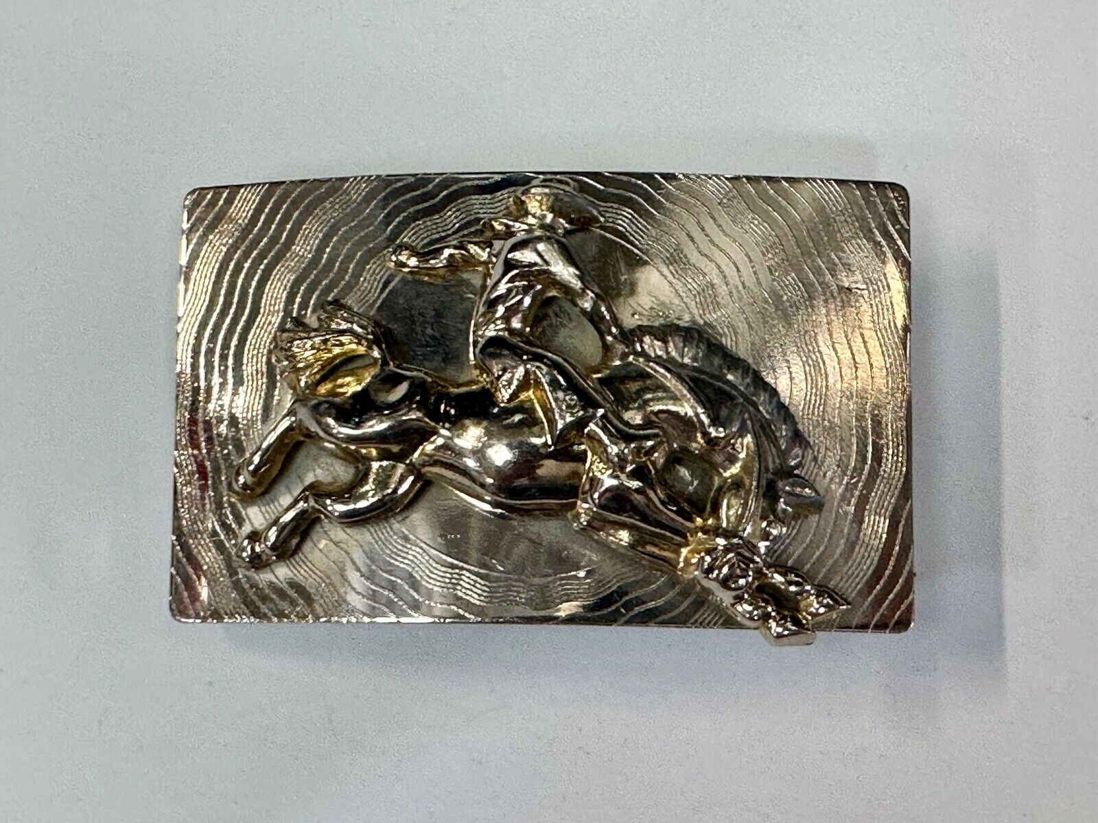 Trippy! Cowboy Saddle Bronc Horse Rider western Impact style belt buckle. - RARE
