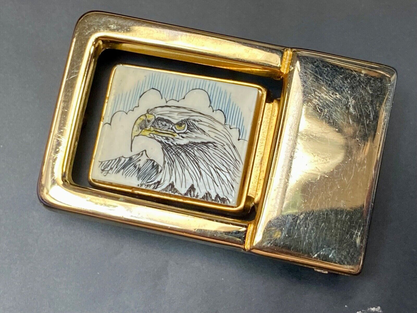 Patriotic American bald Eagle head on small brass or gold color belt buckle
