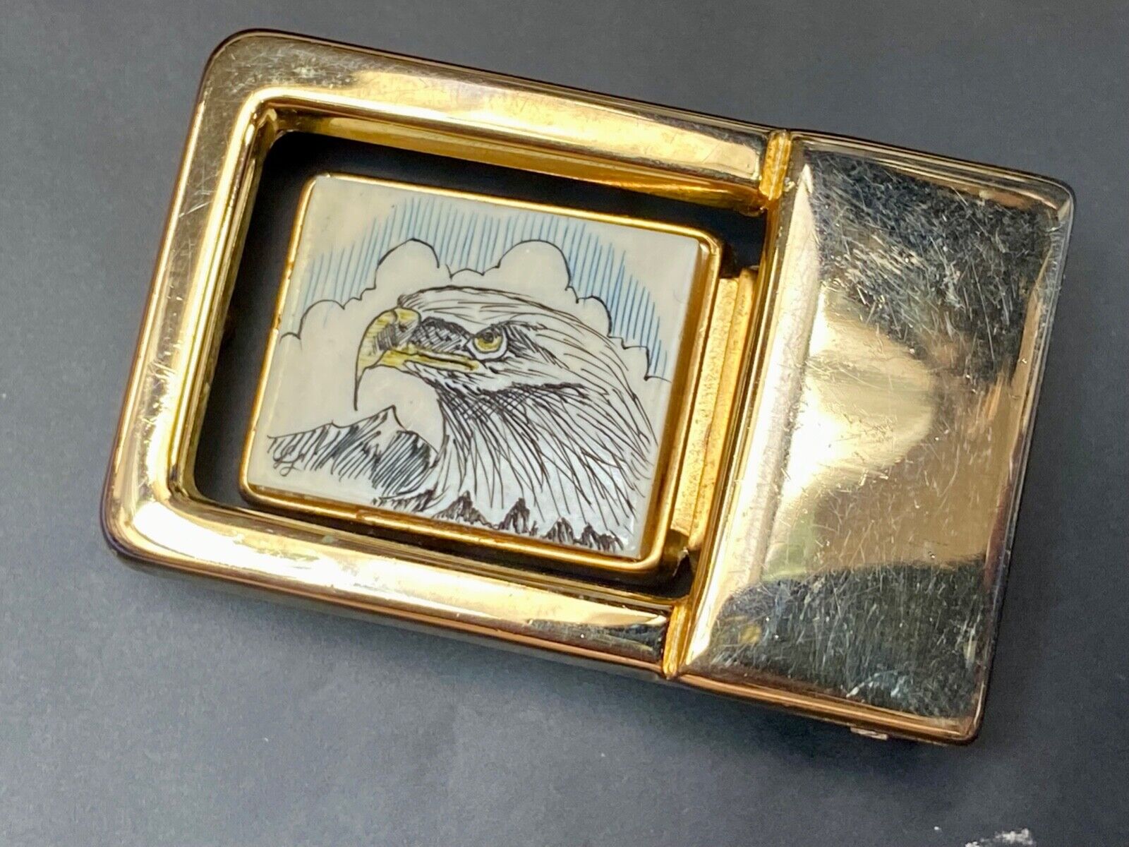 Patriotic American bald Eagle head on small brass or gold color belt buckle