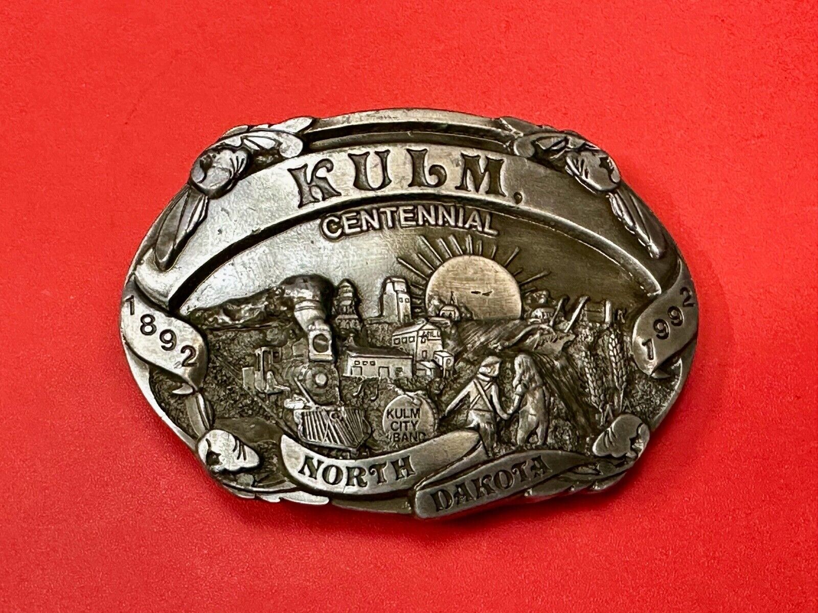 Vintage KULM North Dakota commemorative belt buckle by DART inc.