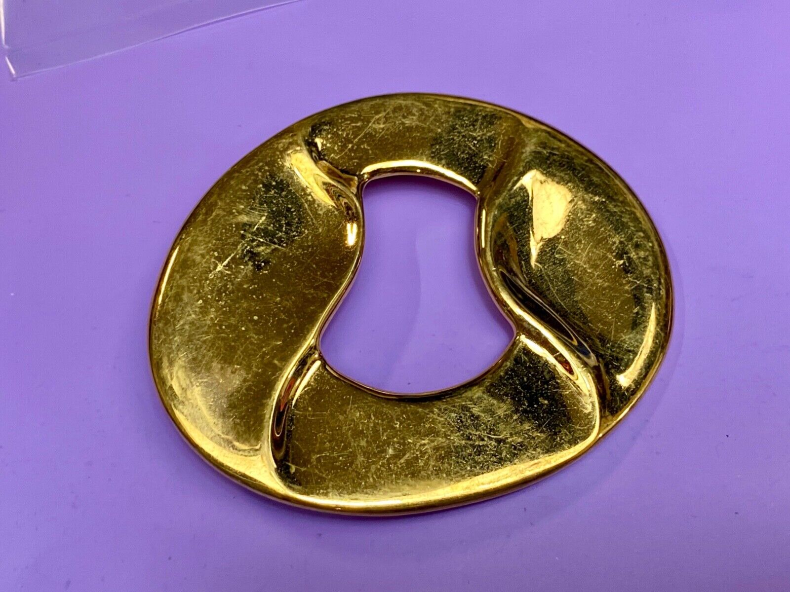 Artist Ginnie Johansen signed gold color abstract oval belt scarf slide