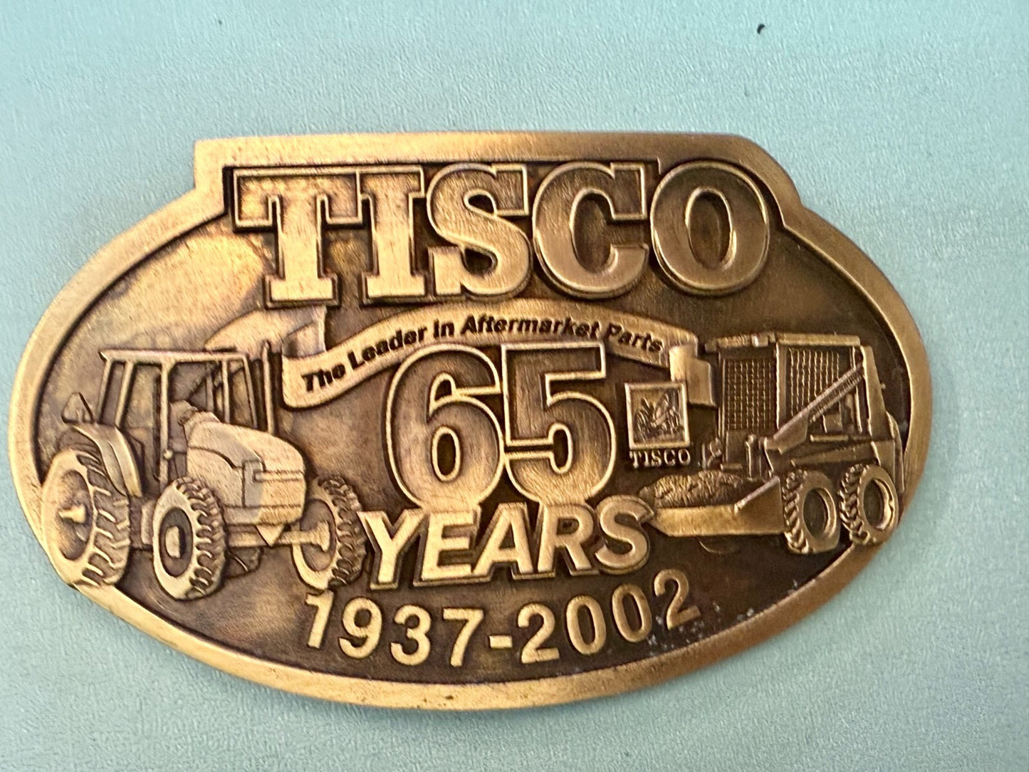 TISCO The Leader in Aftermarket Parts 65 Years 1937-2002 SPEC-CAST Belt Buckle