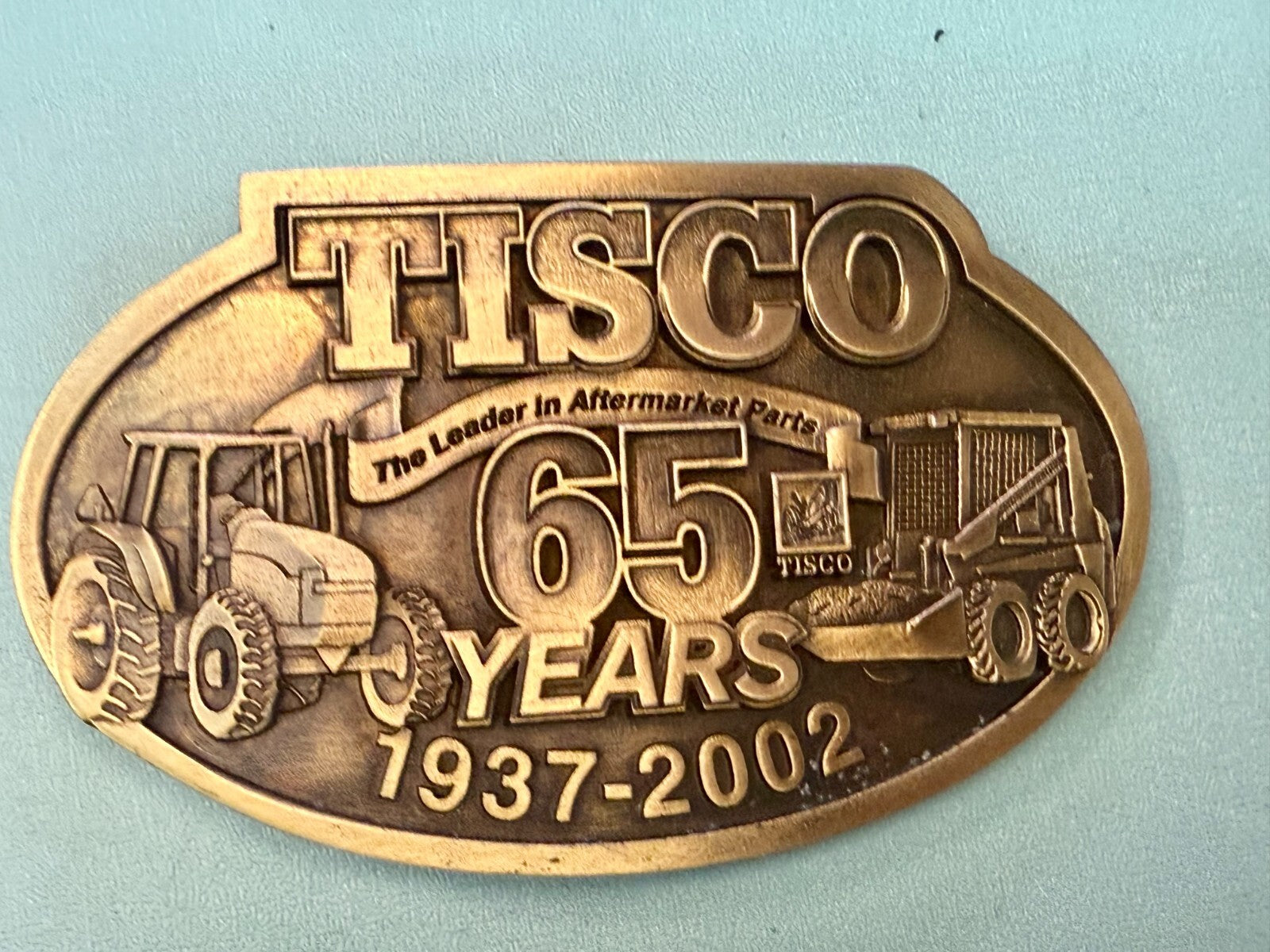 TISCO The Leader in Aftermarket Parts 65 Years 1937-2002 SPEC-CAST Belt Buckle