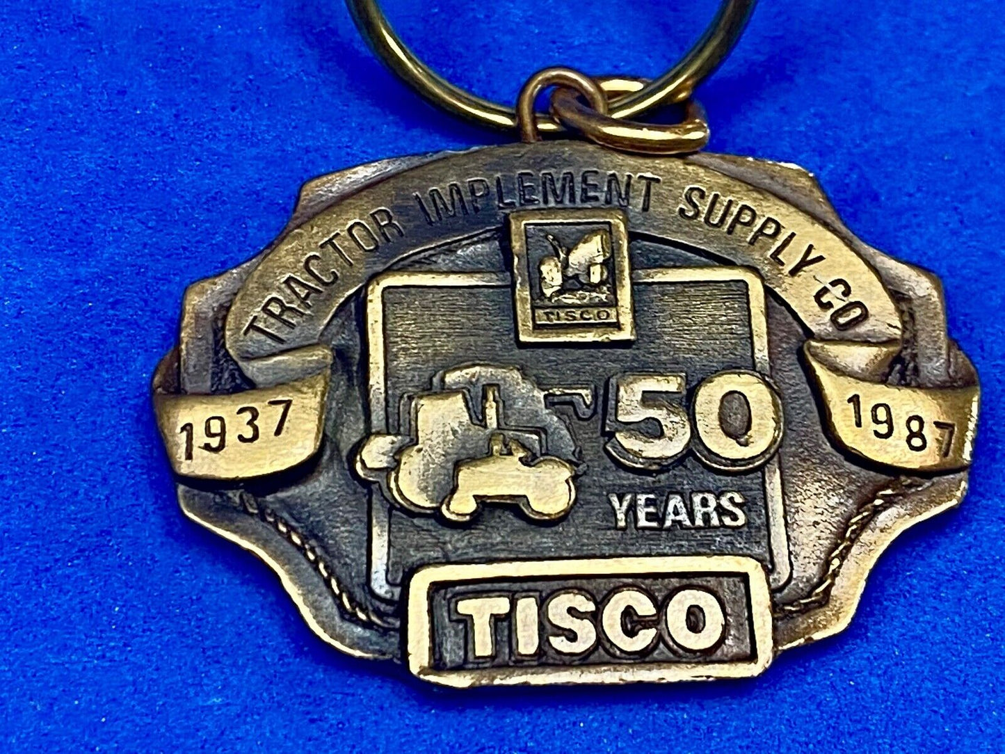 TISCO Tractor Implement Supply Co 50 year celebration NOS Keychain 