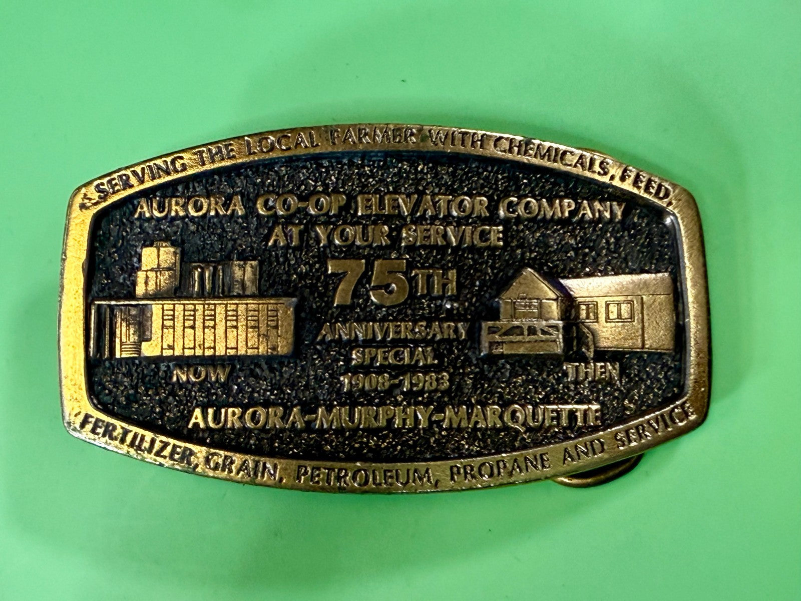 Aurora Co-Op Elevator Company at your Service 75th Anniversary Belt Buckle