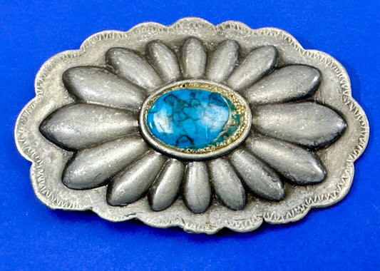 Turquoise stone centered on Vintage metal flower theme belt buckle
