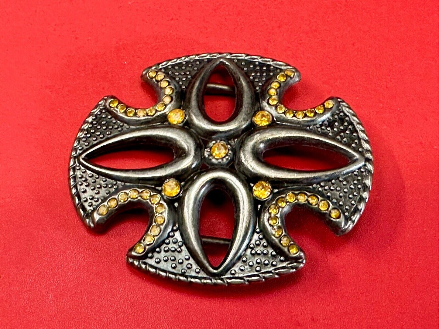 unique see through iron cross with golden brown rhinestone accents