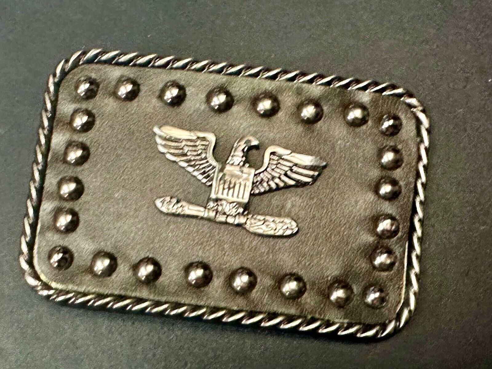 American Eagle - biker style studded black leather background belt buckle