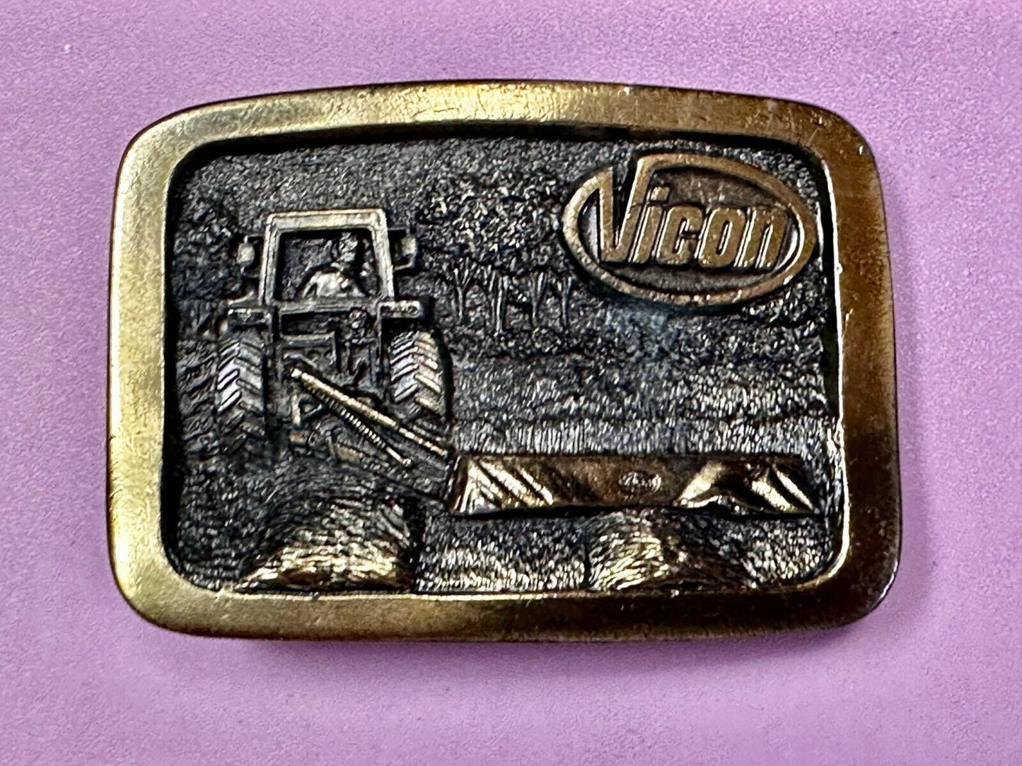 Vicon Disk Mower Tractor Promotional Belt Buckle by Premium Specialties