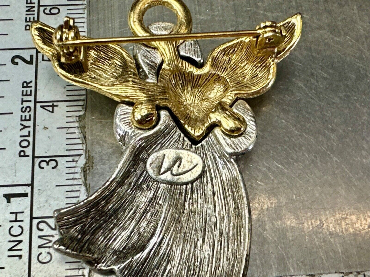 Angle holding heart -vintage two tone LC Liz Claiborne Signed Brooch Pin