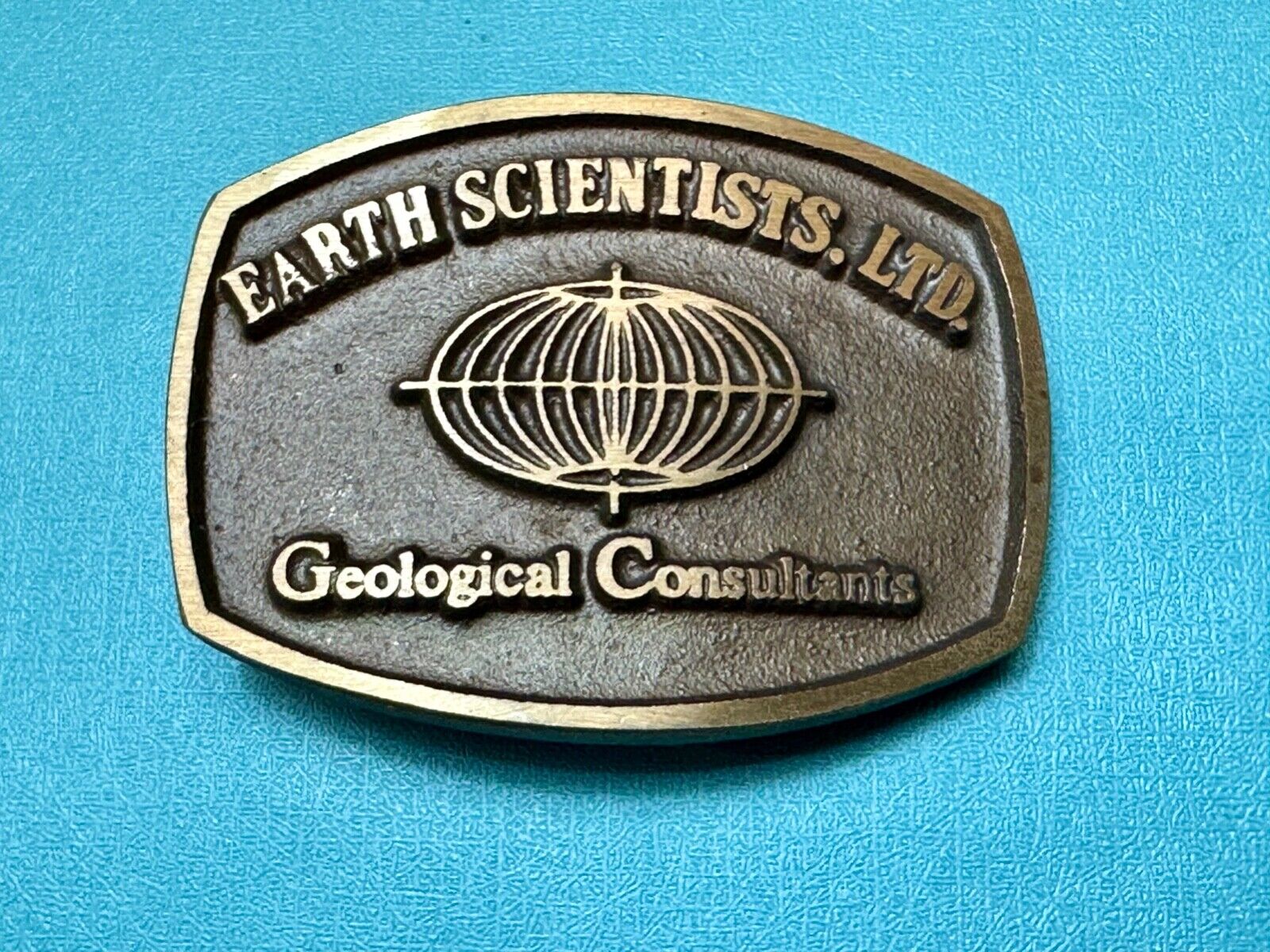 Vintage Earth Scientists LTD 0 Geological Consultants advertising belt buckle