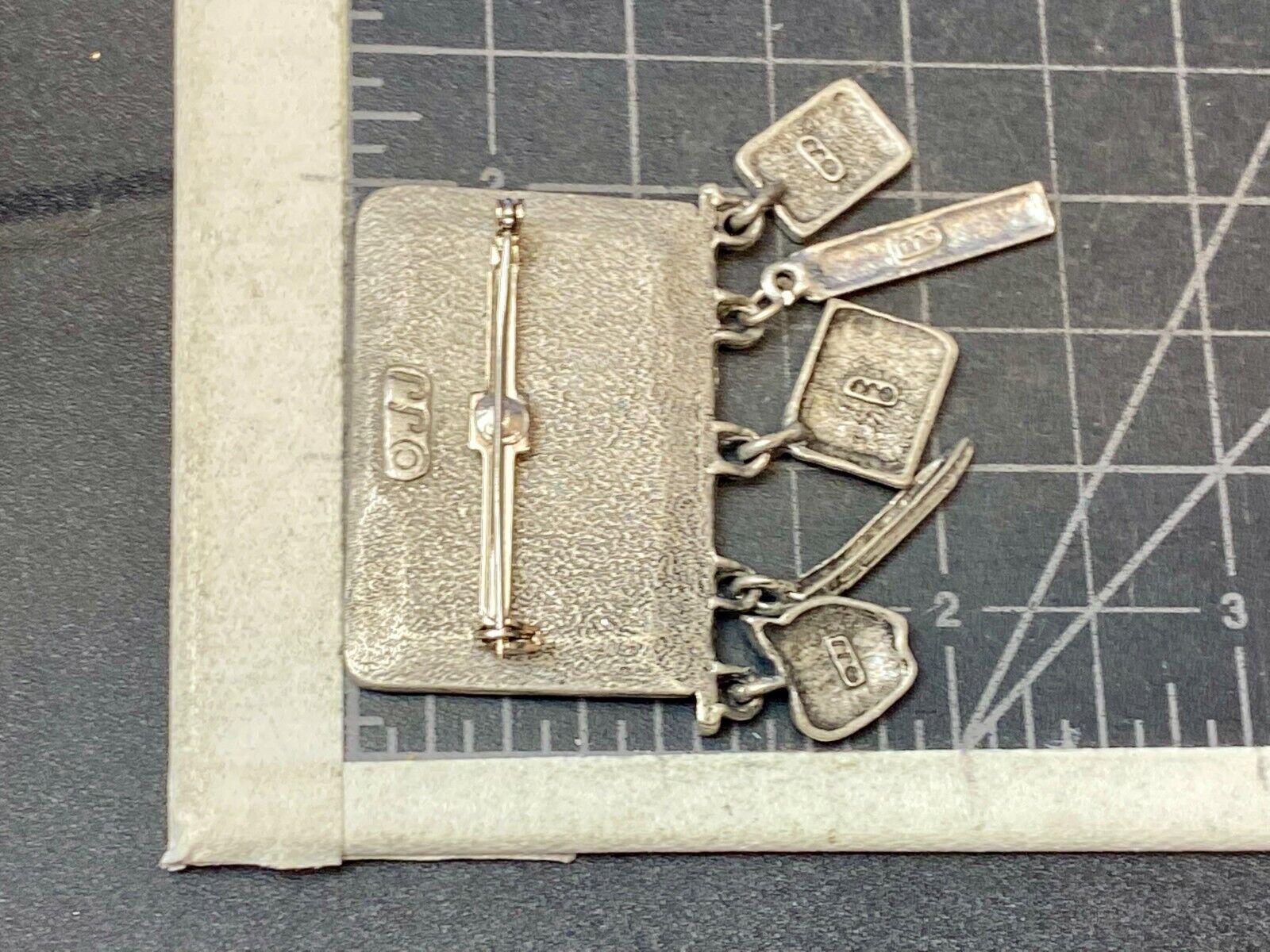 VINTAGE *J.J.*PEWTER MATH TEACHER CHALKBOARD BROOCH PIN W/THEMED FIGURAL DANGLES