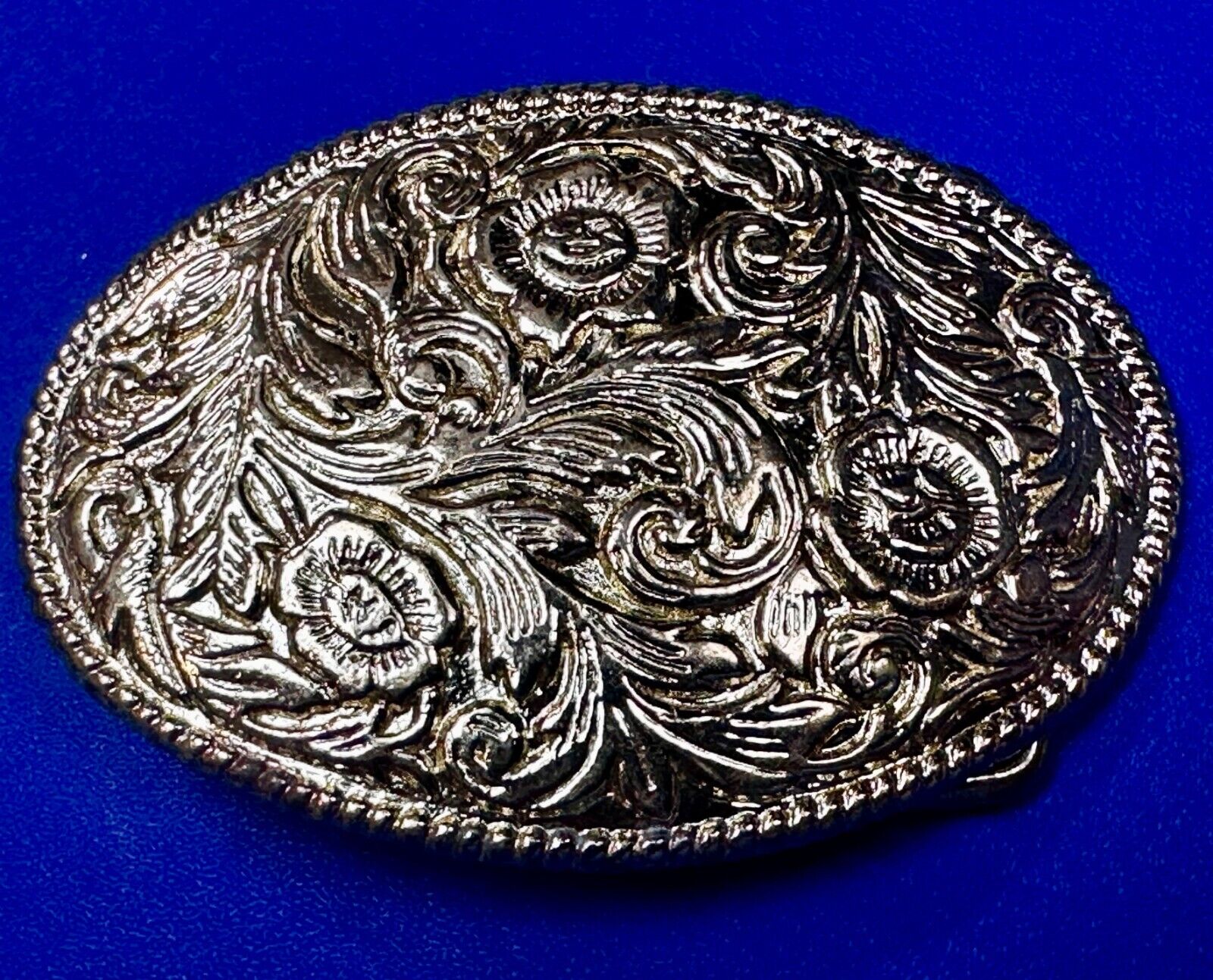 Vintage gold tone western flower swirl design belt buckle