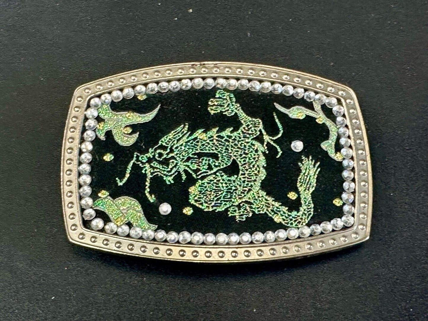 Chinese Dragon pattern symbol on silver tone rhinestone accented belt buckle