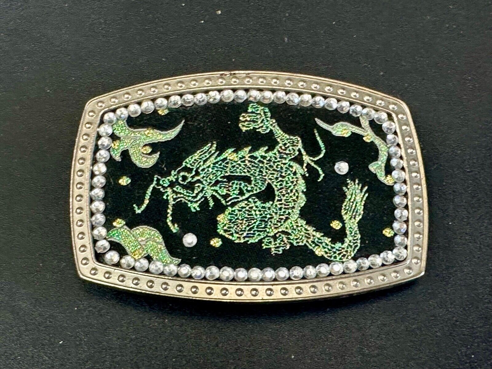 Chinese Dragon pattern symbol on silver tone rhinestone accented belt buckle