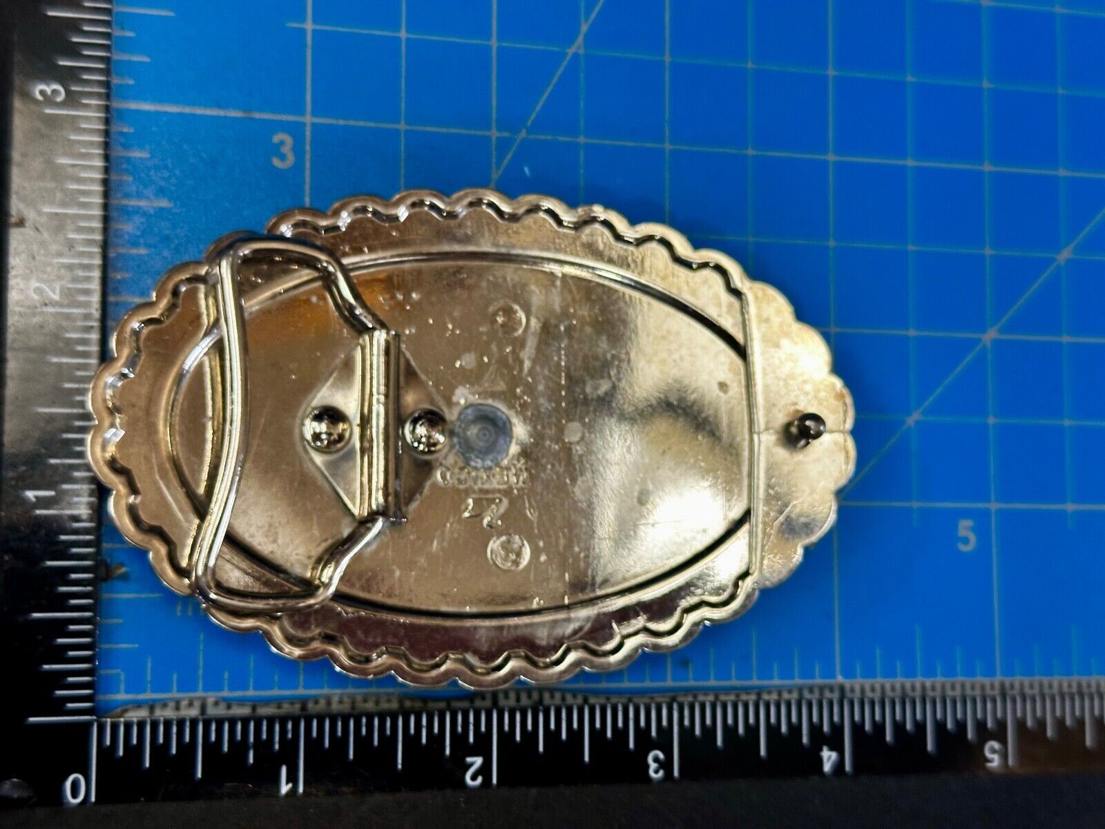 Two horse heads - Vintage two tone oval Belt Buckle with reflective backing