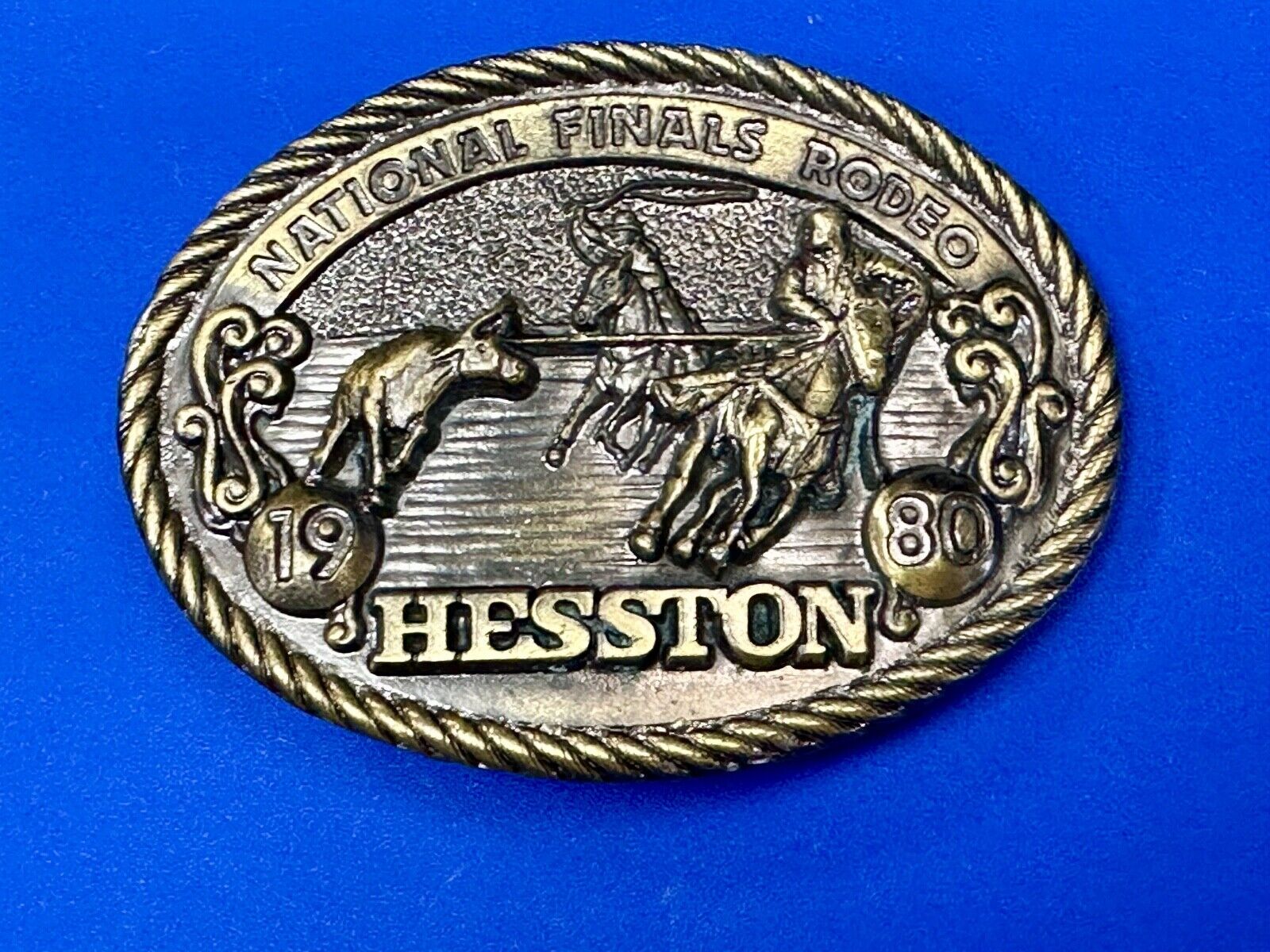 1980 NFR Rodeo Vintage Hesston Cow Roping Steer Wrestling Cowboy belt buckle