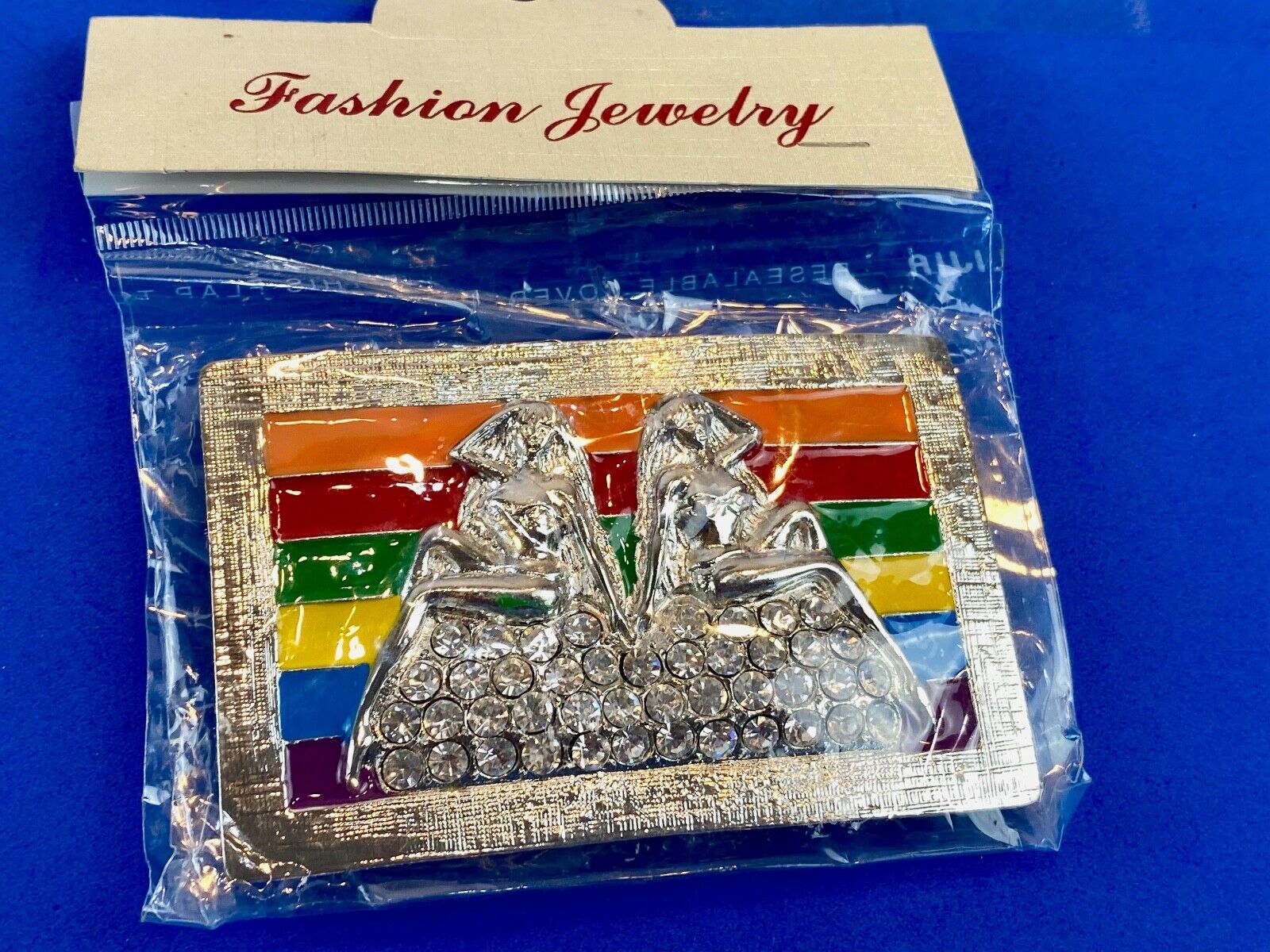 Two women on mound of rhinestones Rainbow colors belt buckle - lgbt lesbian