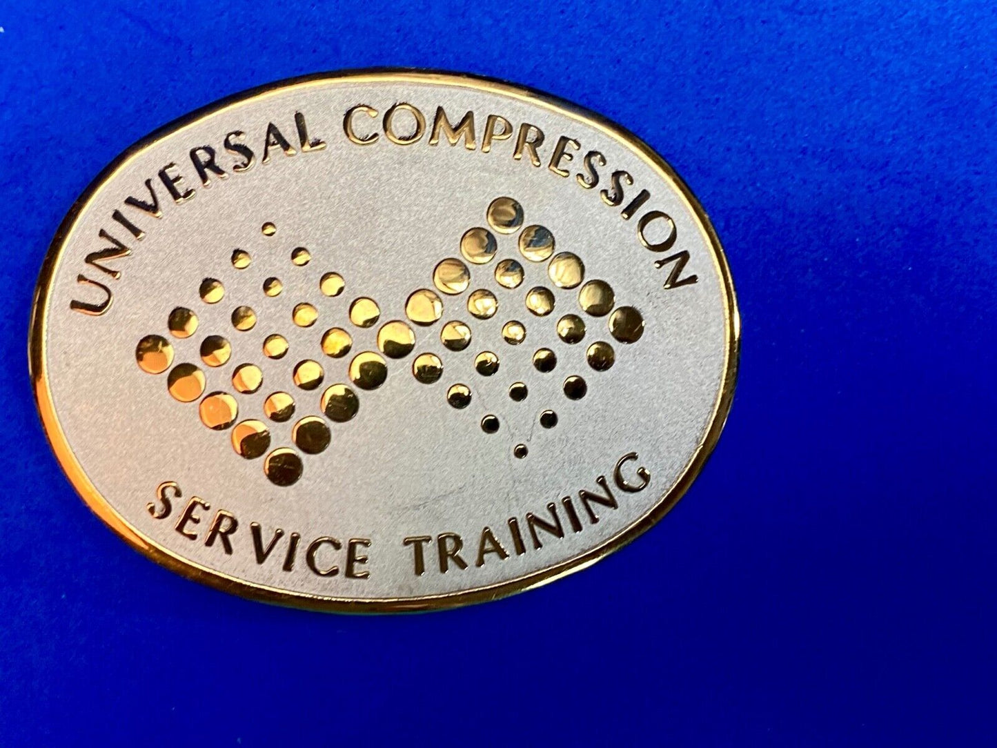 Universal Compression Service Training Company Award Belt Buckle