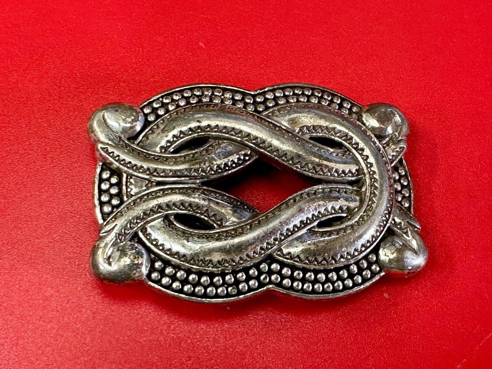 Vintage knot pattern see through silver tone belt buckle