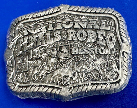 1999 Youth Sized Hesston National Finals Rodeo 2000 series belt buckle in wrap