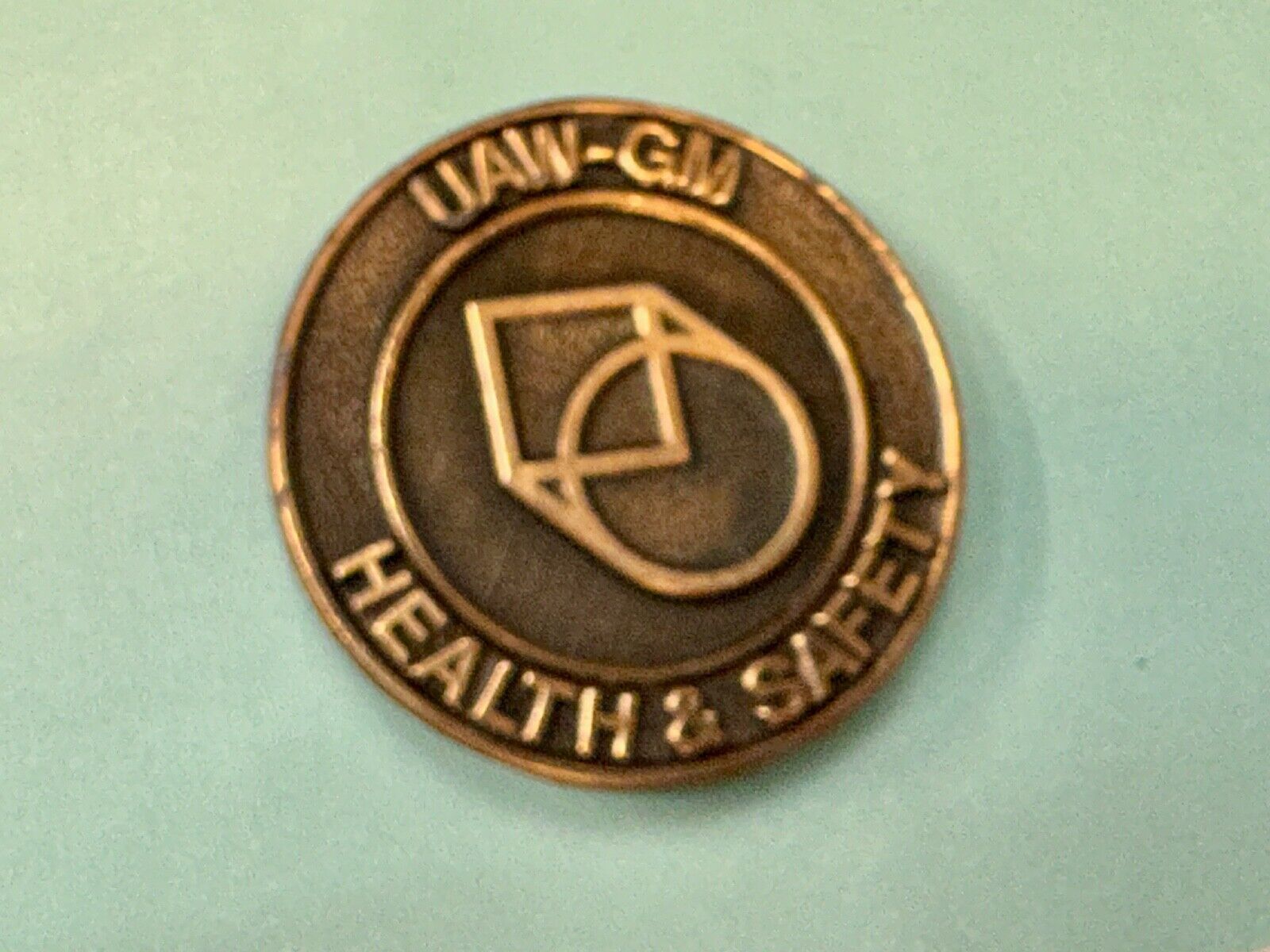 UAW-GM auto workers union round Health & Safety Award belt buckle