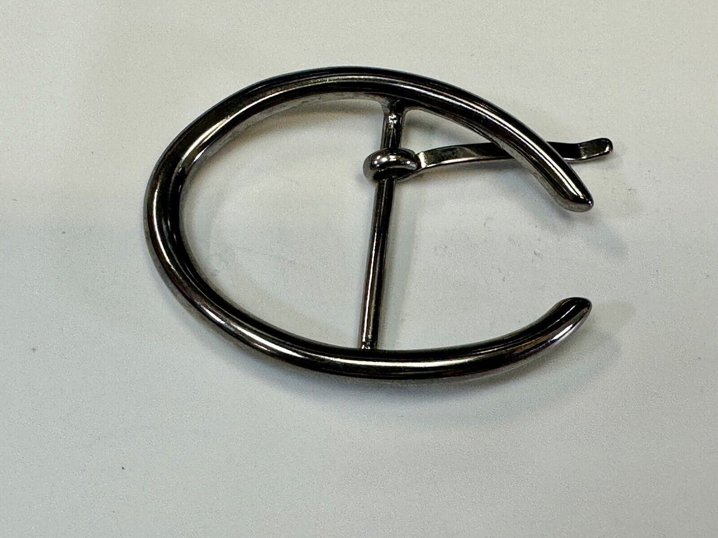 unique open oval black colored dress style belt buckle