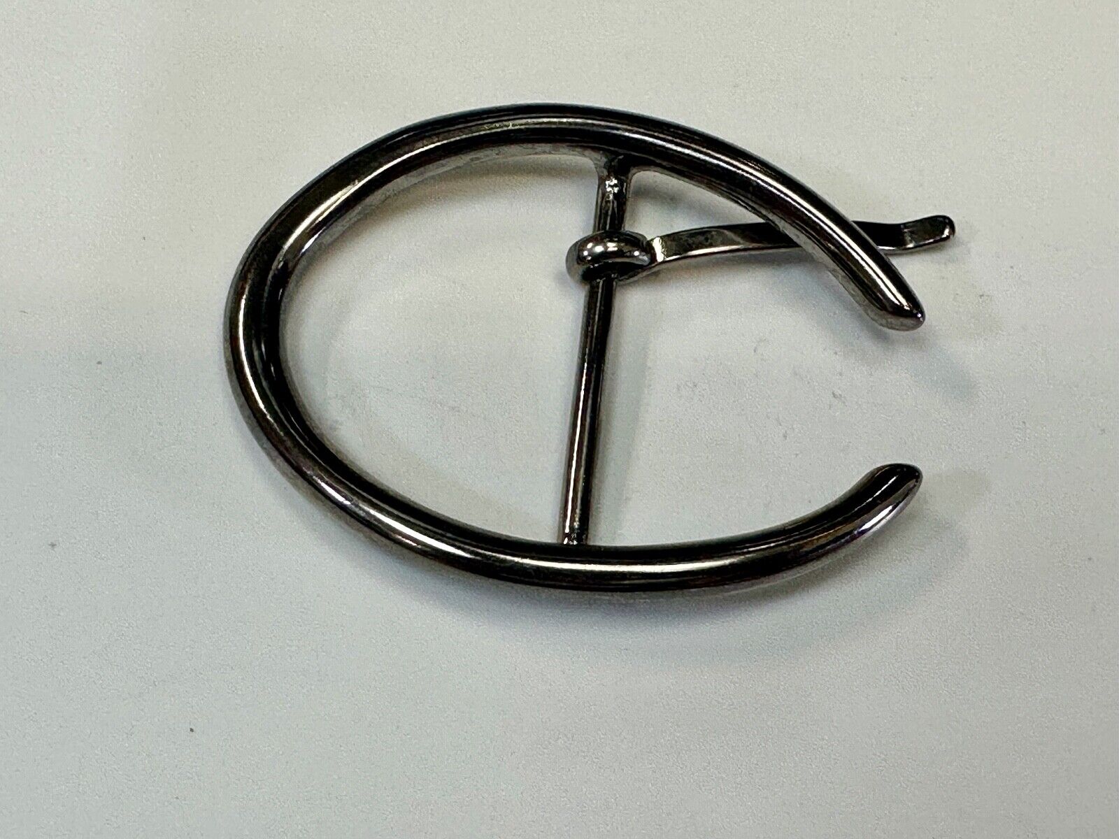 unique open oval black colored dress style belt buckle