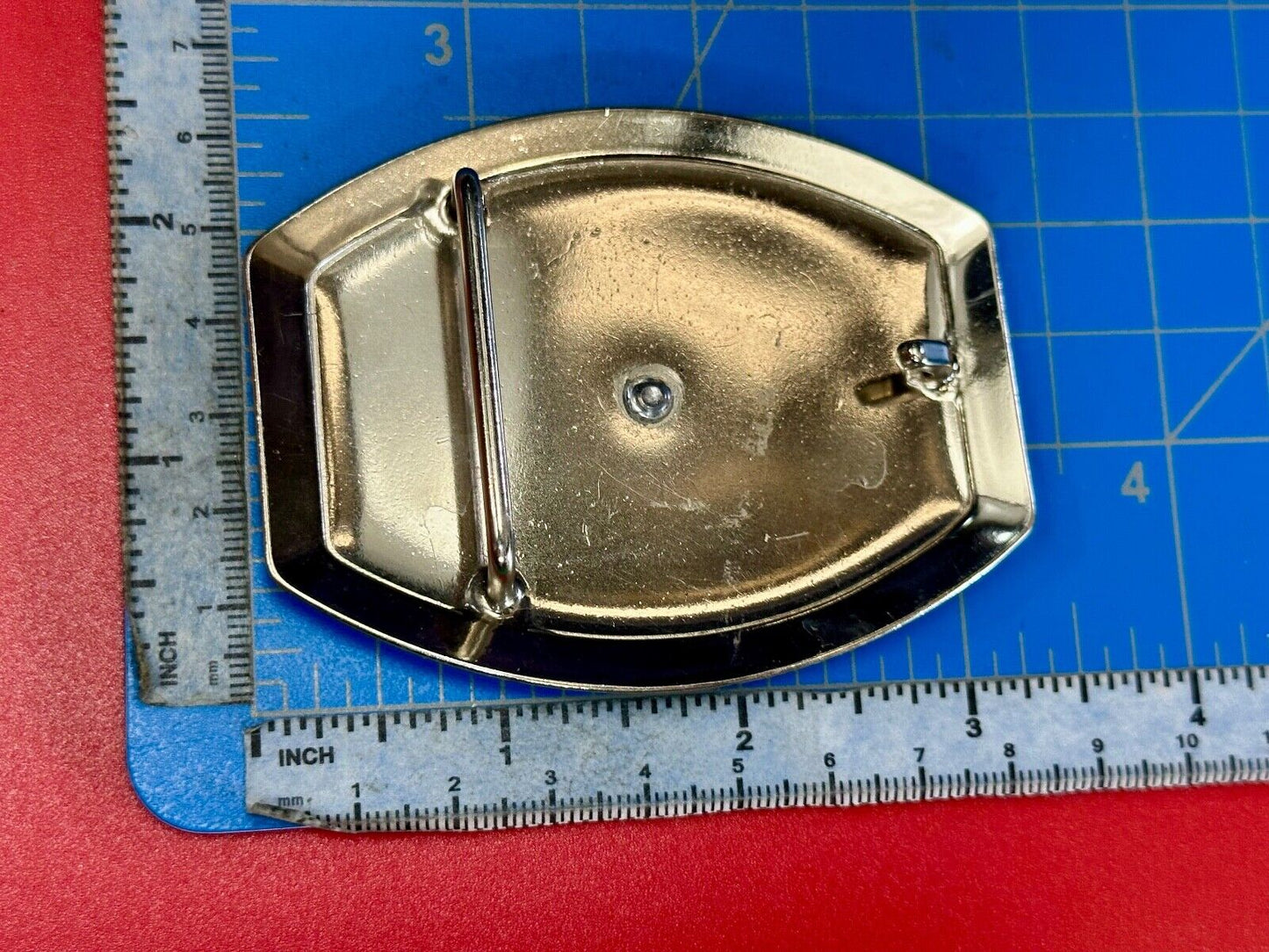 Vintage Horseback Riders cowboys belt buckle with black & white enamel accents