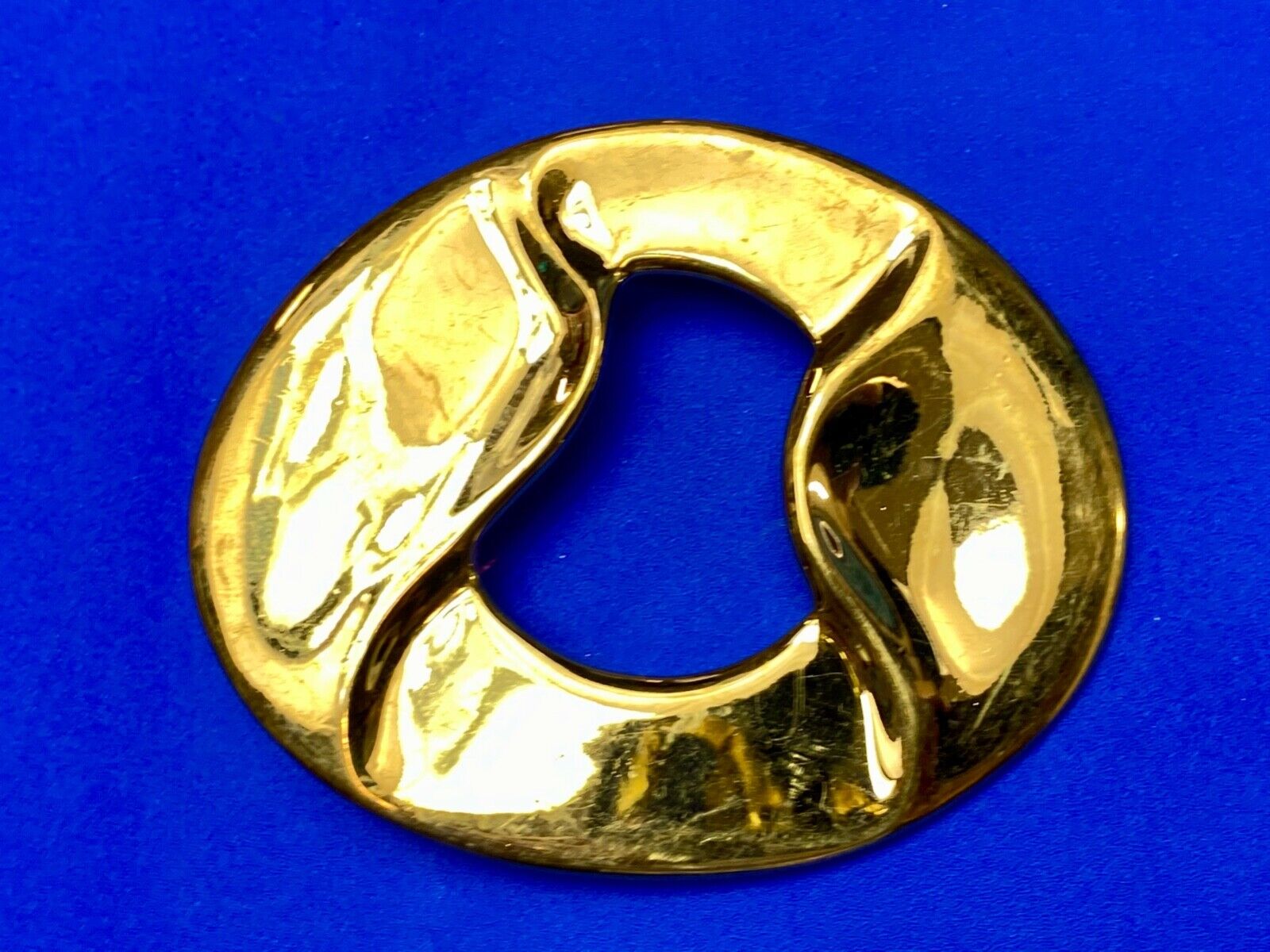Artist Ginnie Johansen signed gold color abstract oval belt scarf slide