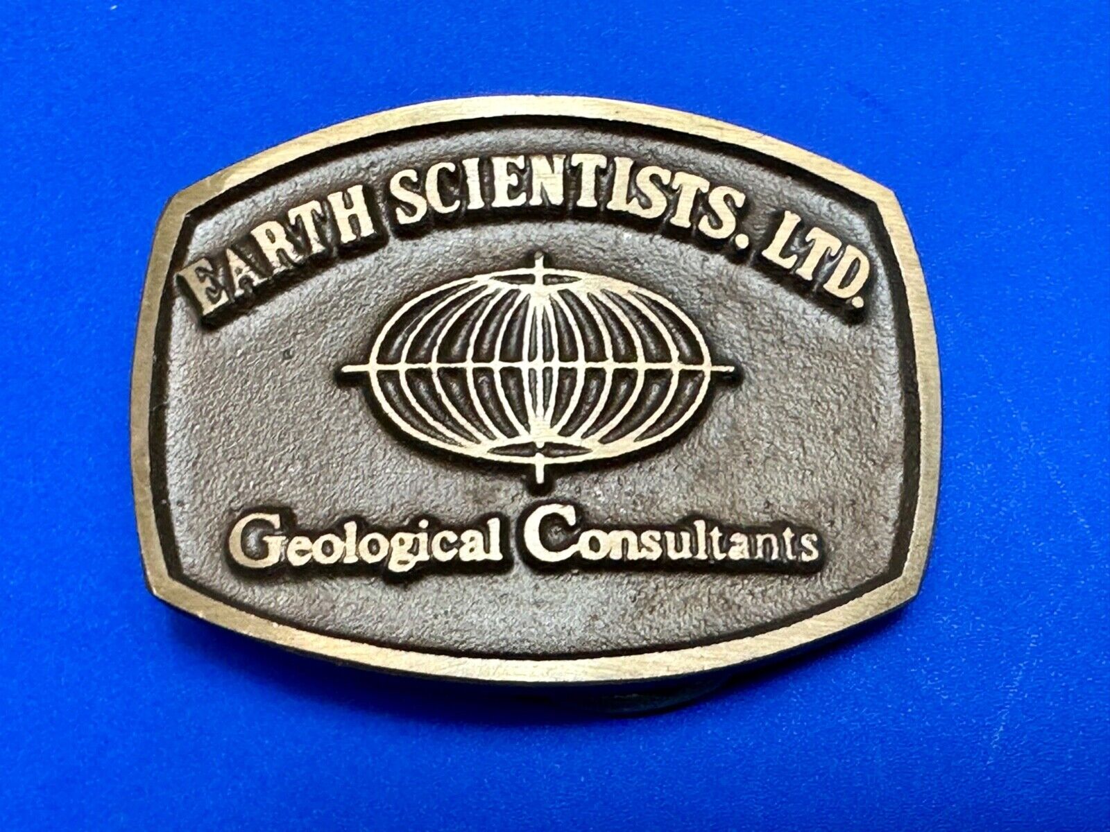 Vintage Earth Scientists LTD 0 Geological Consultants advertising belt buckle