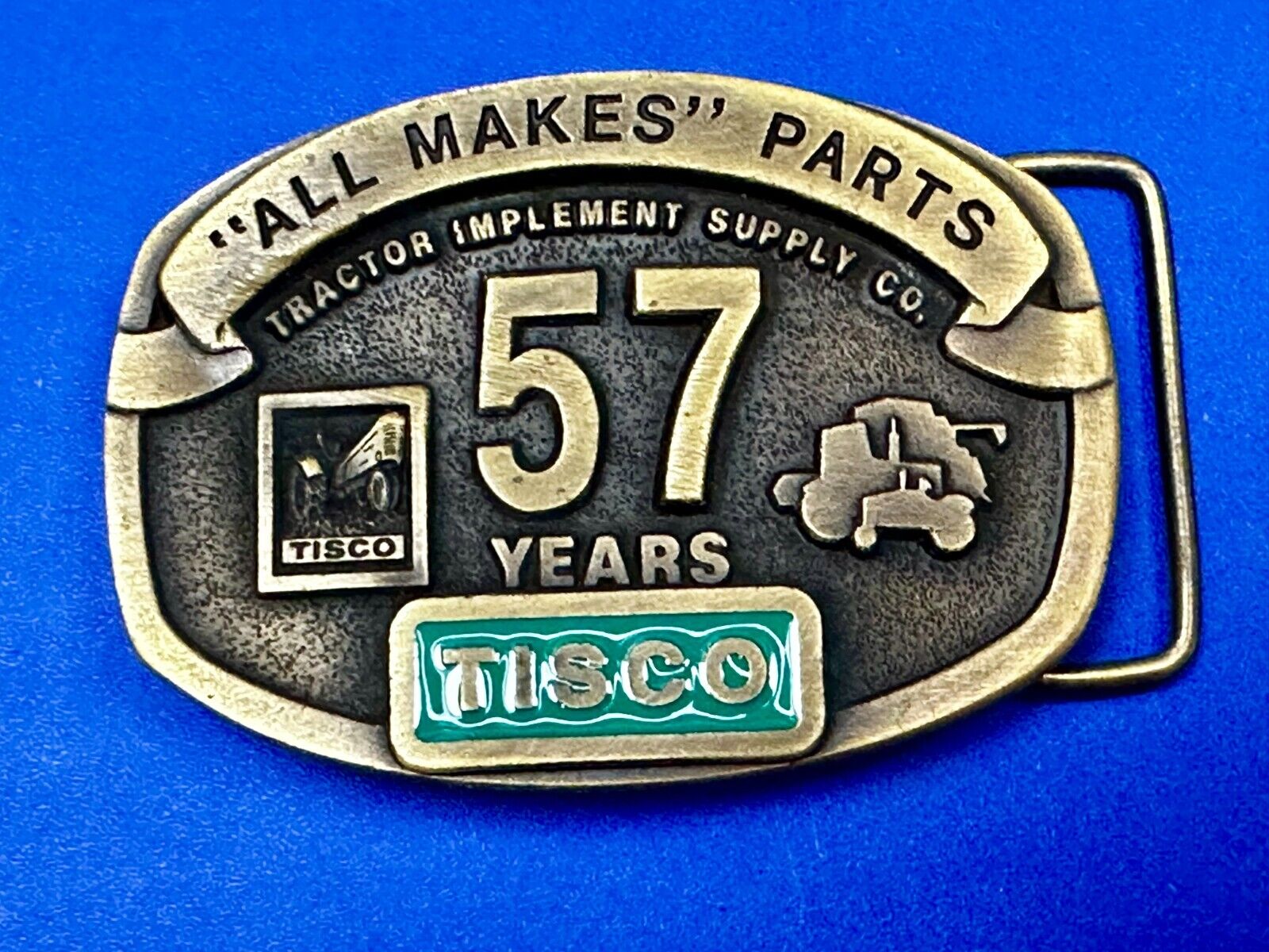 57 Years TISCO Tractor Implement Supply company NOS Belt Buckle by Speccast