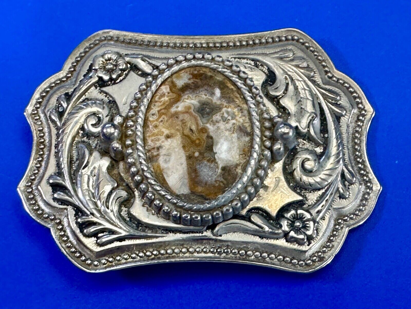 Vintage cabochon cab stone centerpiece on western silver tone belt buckle