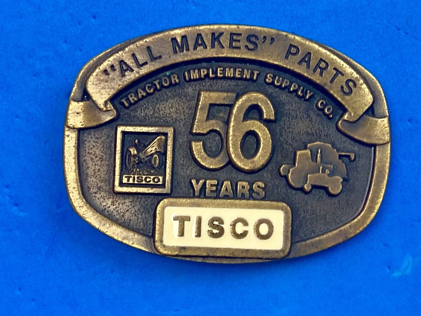TISCO 56 Years ALL MAKES PARTS Tractor Service belt buckle Series 4 1993 