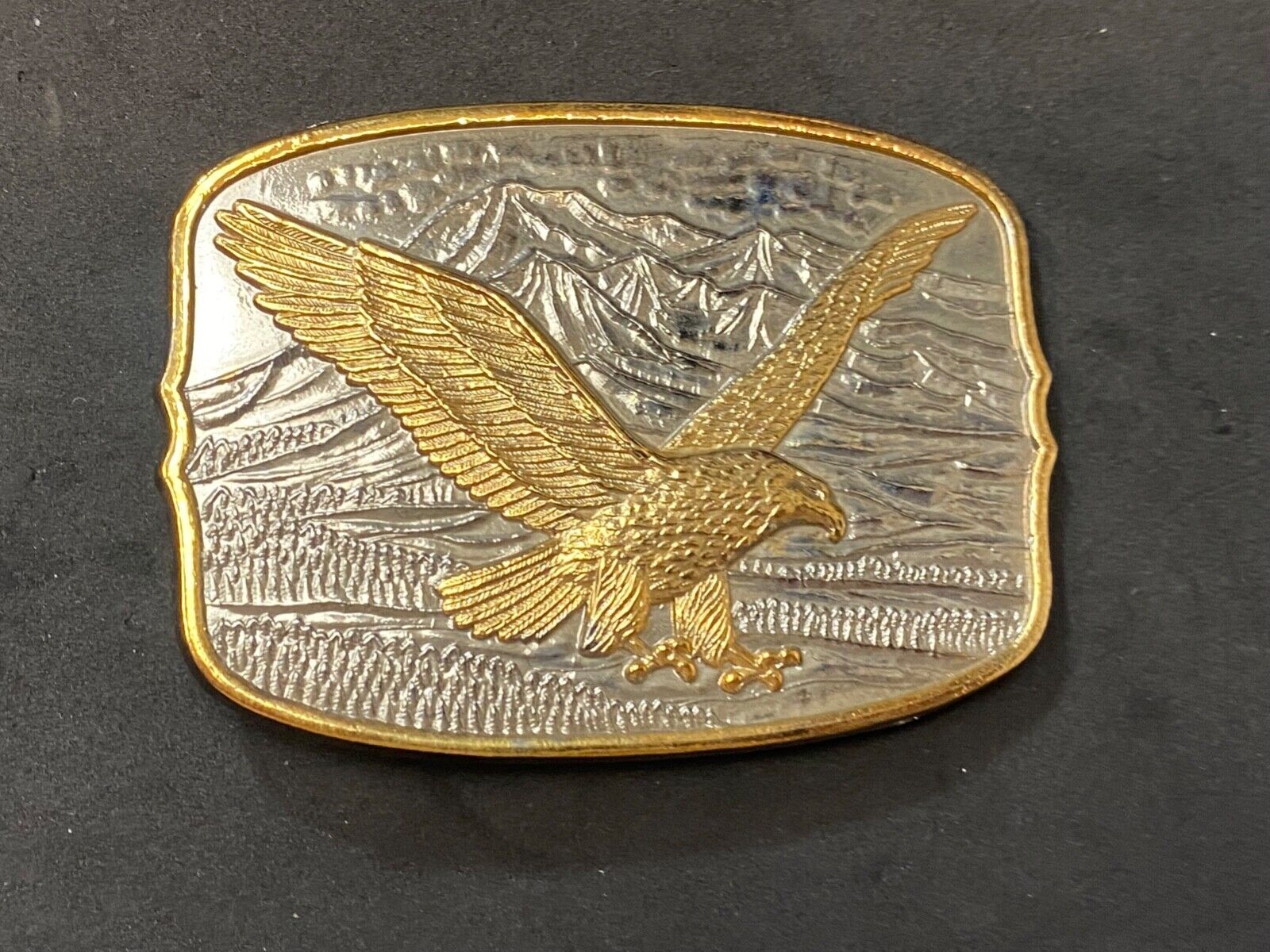 AMERICAN EAGLE Majestically hunting flying over mountains Numbered belt buckle