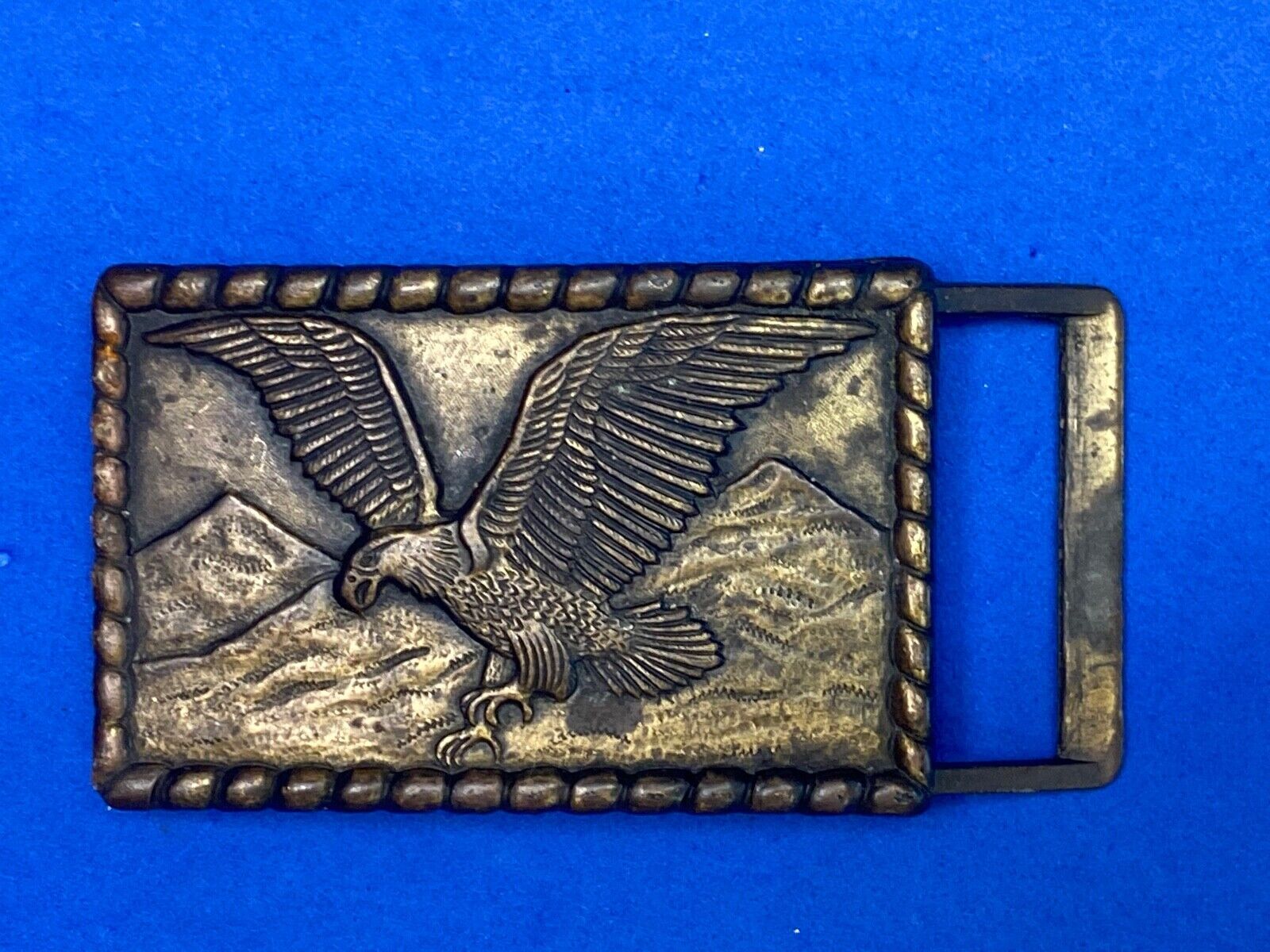 Hunting, Diving Flying Patriotic Eagle Over Mountain Range Belt Buckle 