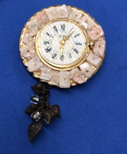 Unique Artisin Hat Flower Pin Broach From Gold Tone Guess Watch - interesting!