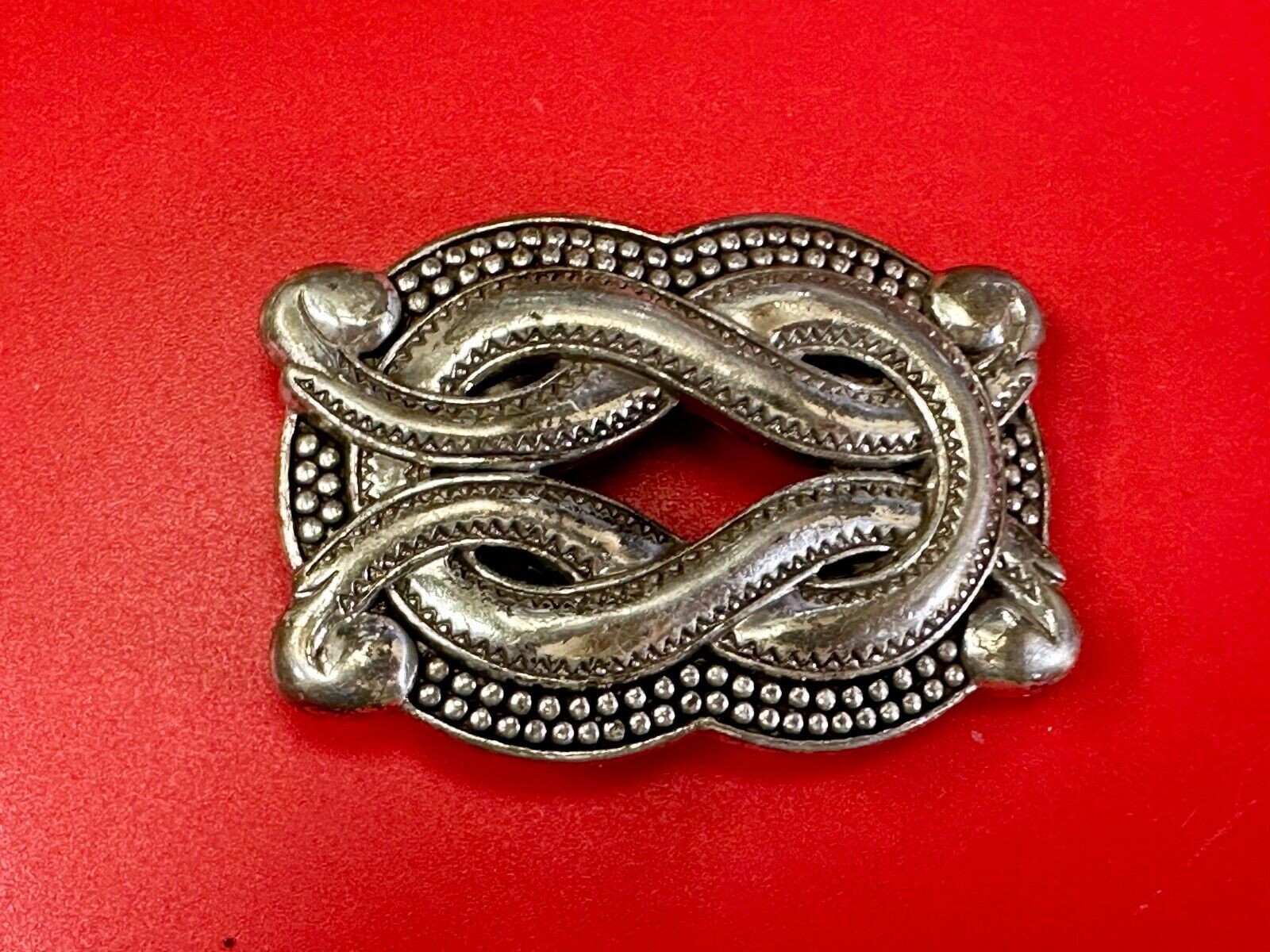 Vintage knot pattern see through silver tone belt buckle