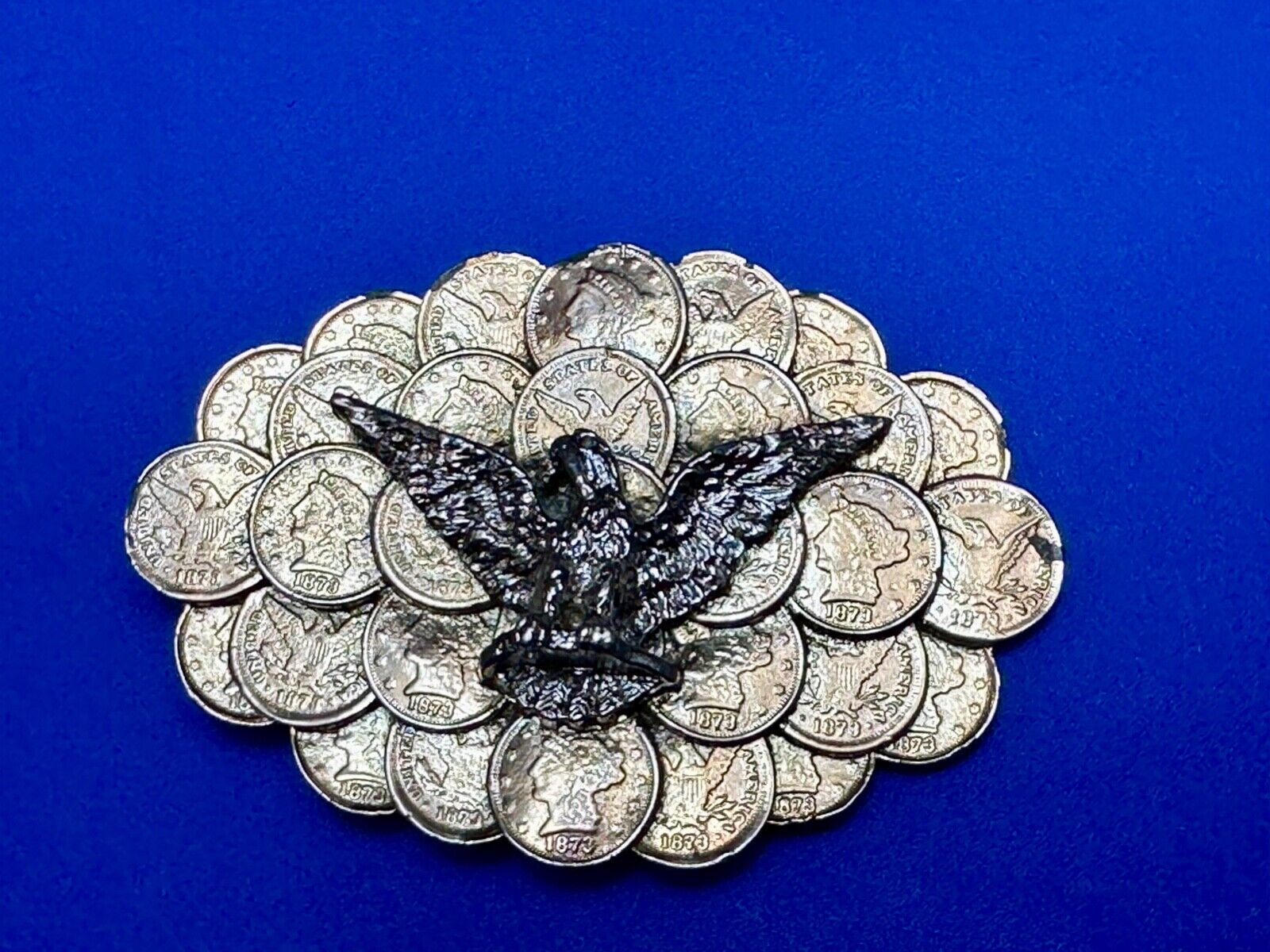 American Eagle wings wide over cluster of Indian Head Coins belt buckle