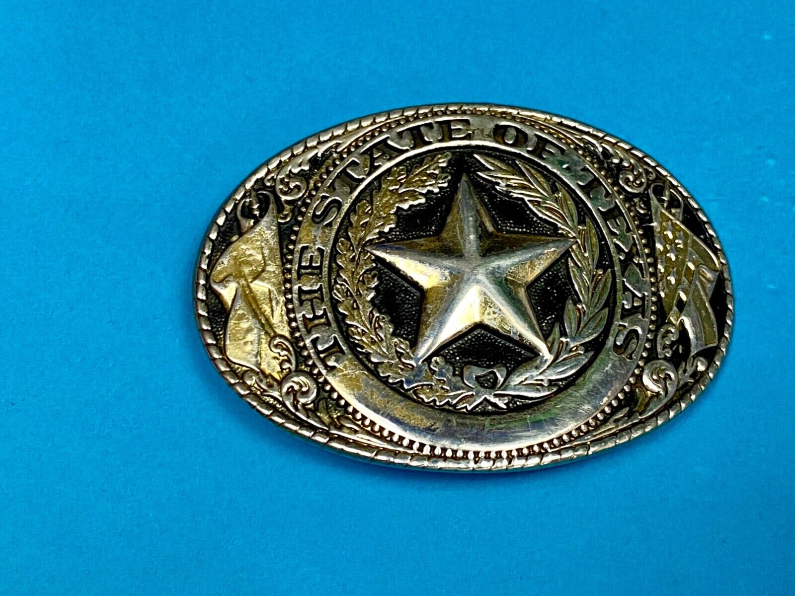 The Great State Of Texas Star & Olive Branch Western Oval Belt Buckle Stamped W