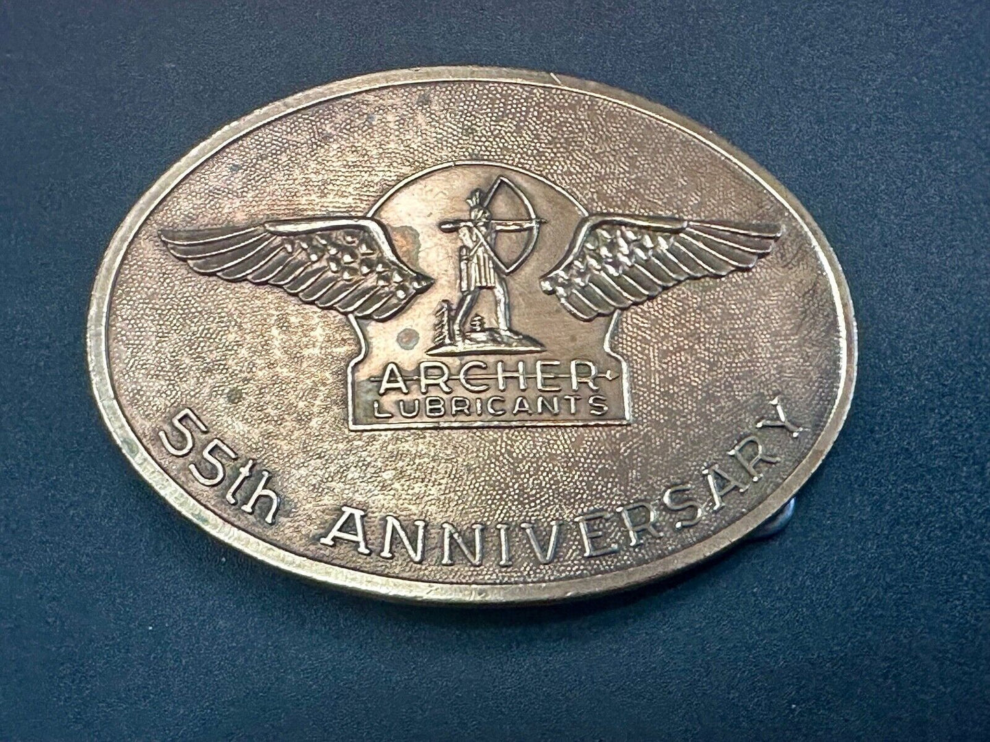 Archer Lubricants Omaha NE - Oil for farmers ranchers belt buckle