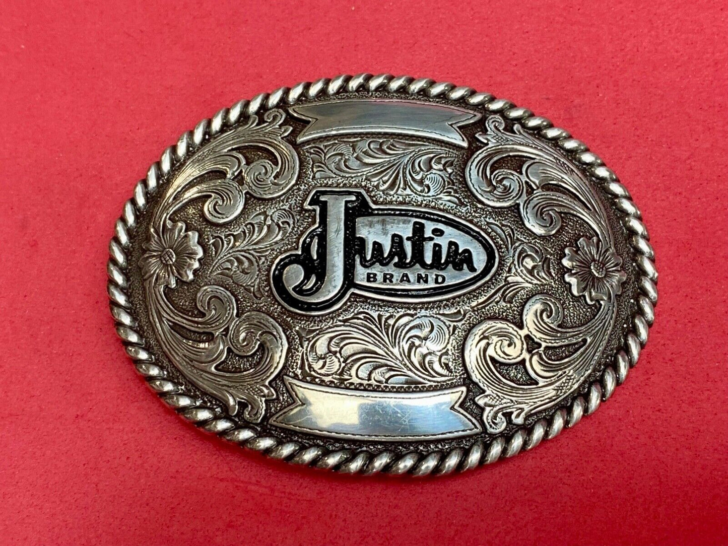 Vintage Justin Cowboys ornate flower swirl Belt Buckle with blank trophy scroll