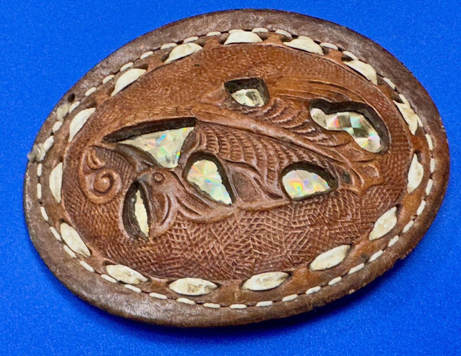 Unique leaf pattern in leather belt buckle made of Abalone shell