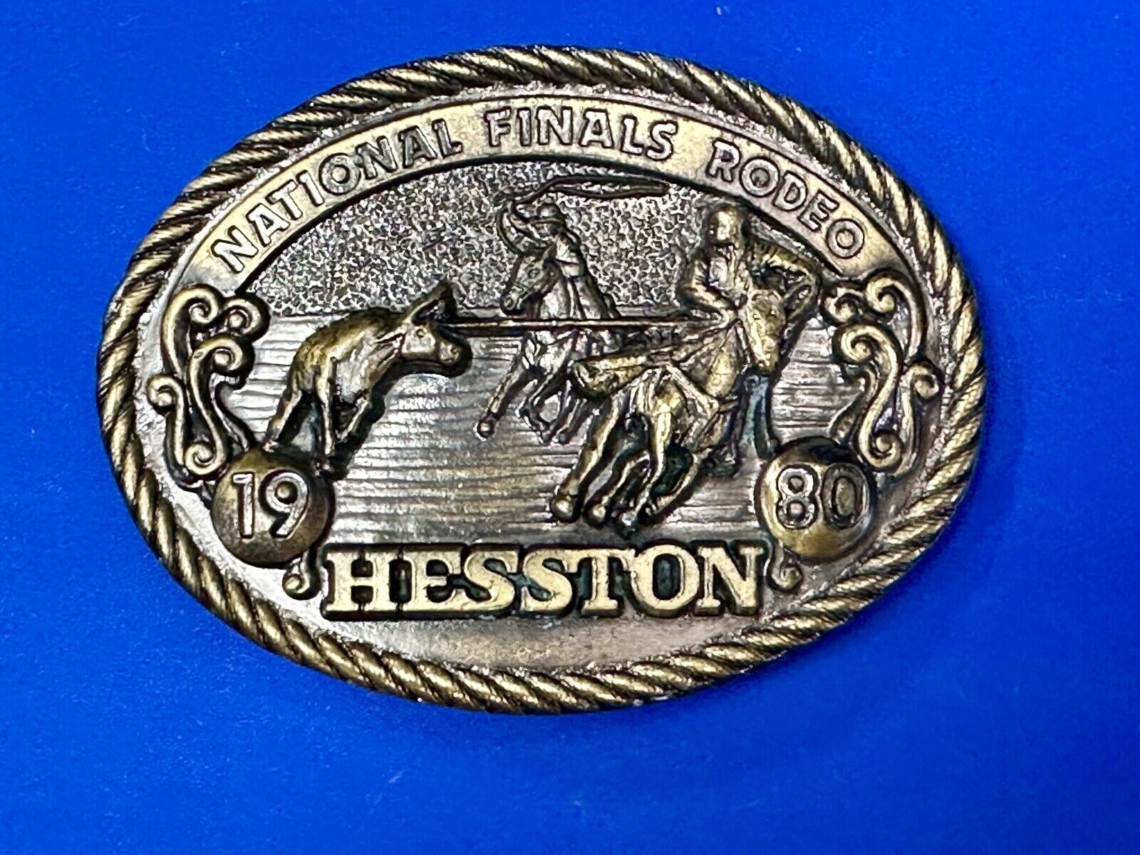 1980 NFR Rodeo Vintage Hesston Cow Roping Steer Wrestling Cowboy belt buckle