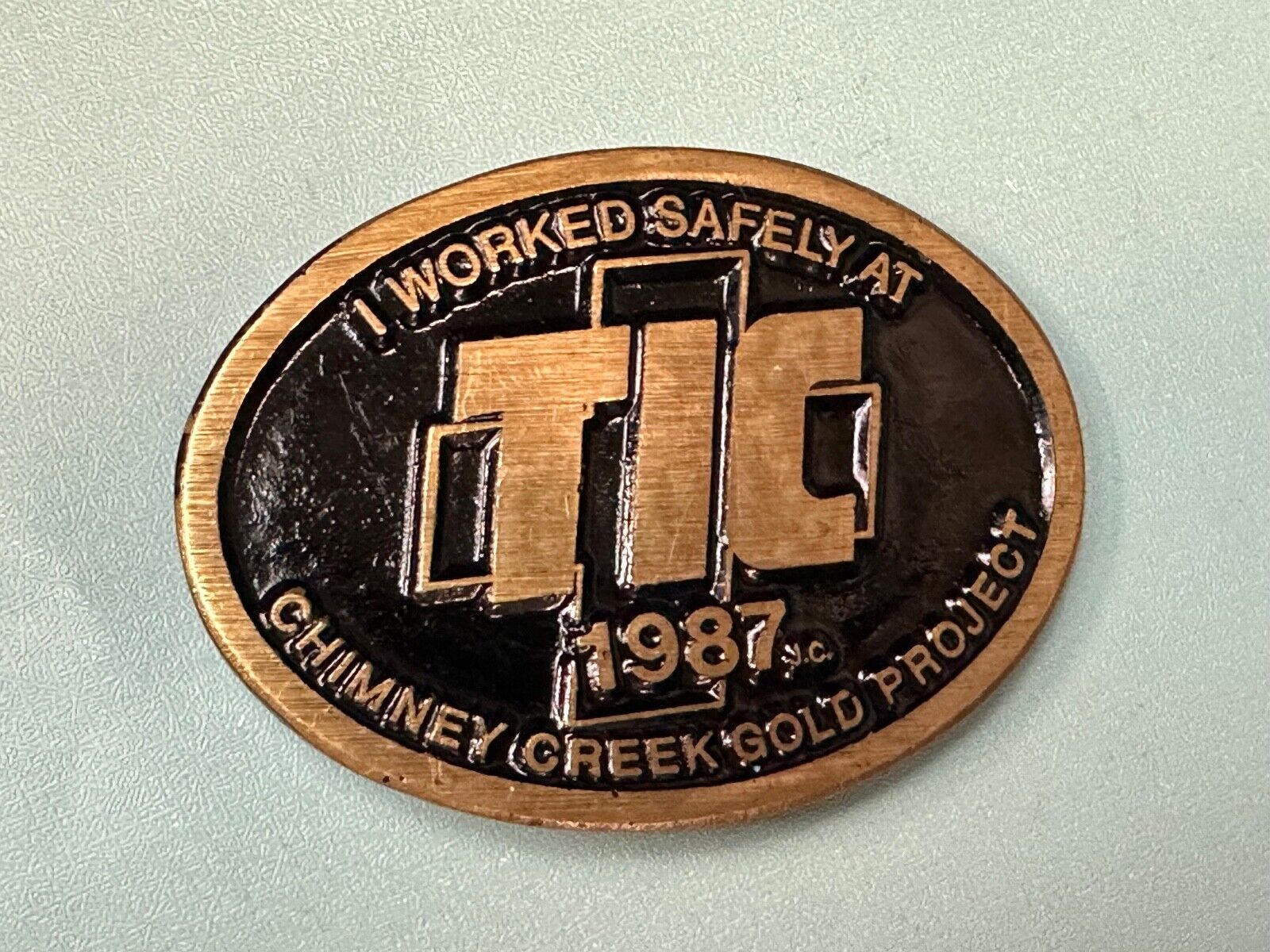 Vintage 1987 TIC Chimney Creek Gold Project Safety award brass belt buckle