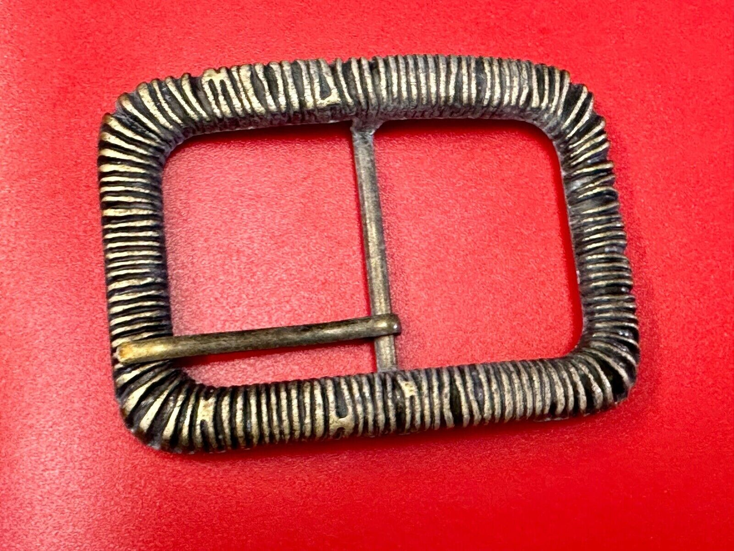 Unique Center Bar Spring abstracted wrapped style rectangular belt buckle