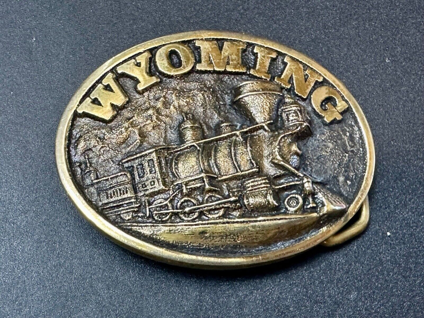 The great state of Wyoming Train History brass belt buckle by Heritage Mint LTD