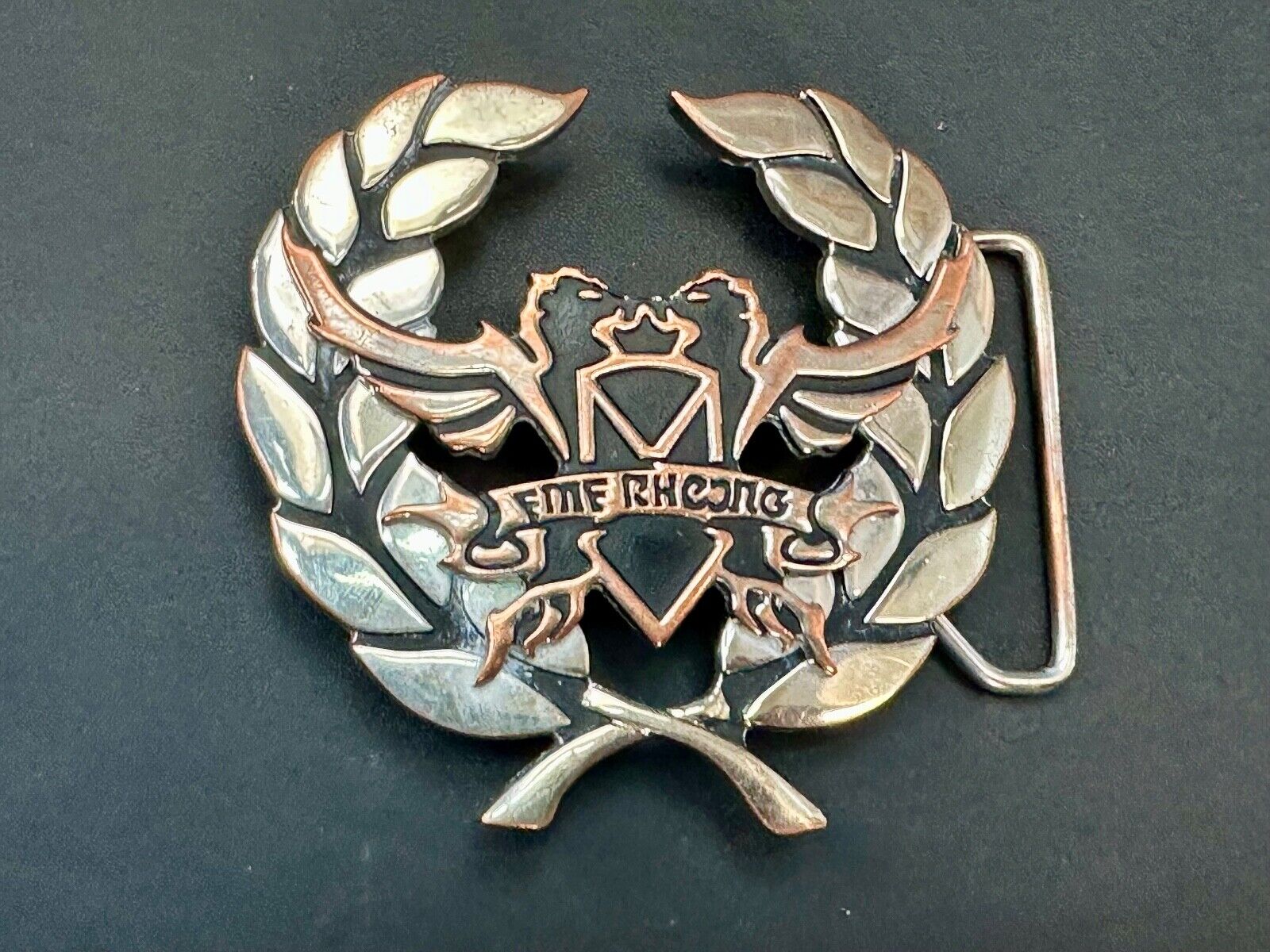Two griffins?  FME RheJNG Olive branch cutout belt buckle
