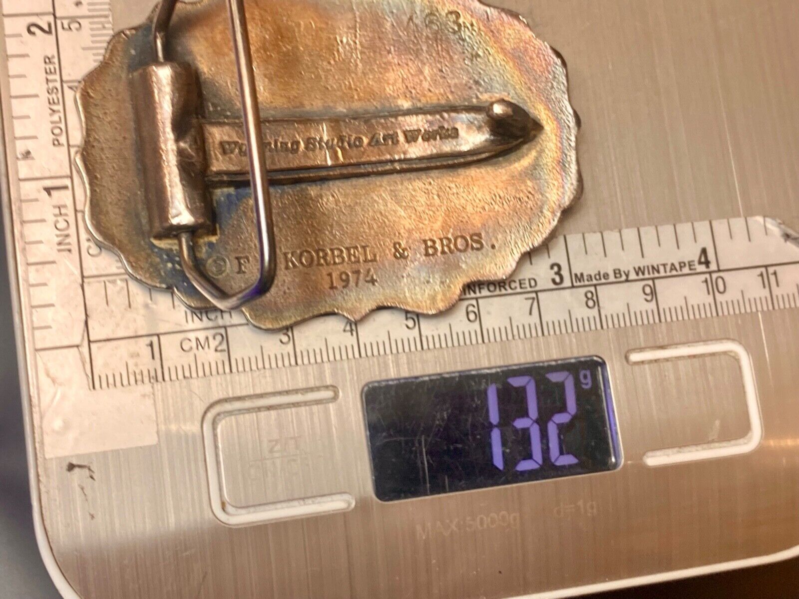 vintage Korbel Fine California champagne belt buckle by Wyoming Studio Art